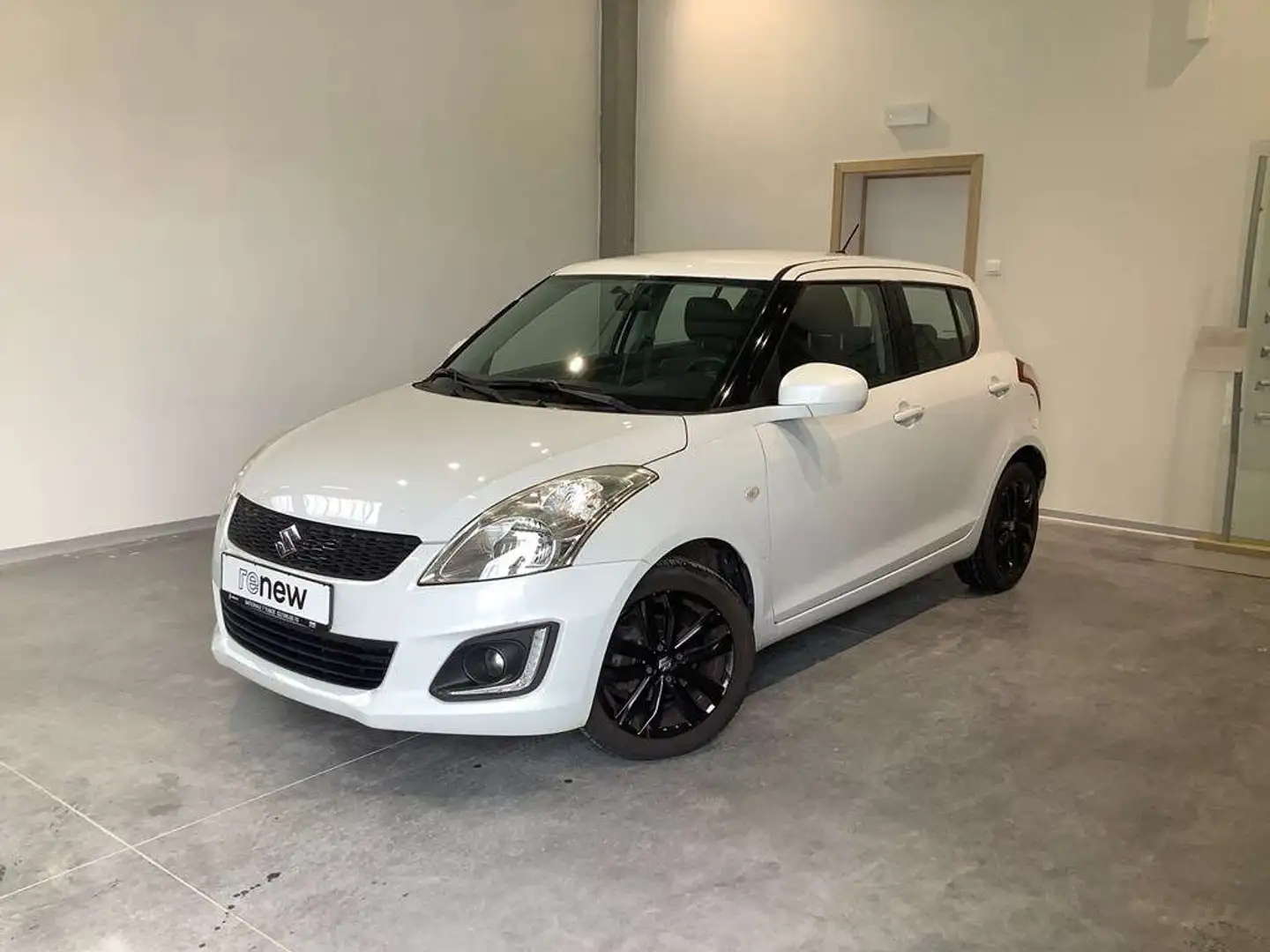 Suzuki Swift . Blanc - 1