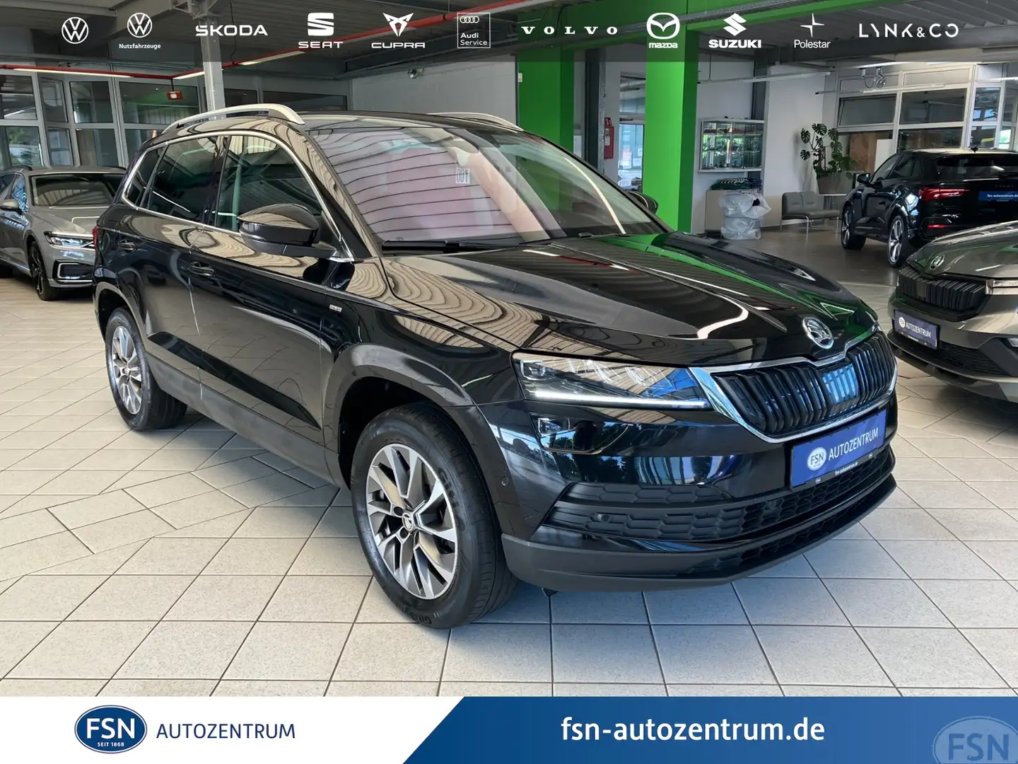 Skoda Karoq 2.0 TDI Clever 4x4 DSG AHK STHZG NAVI AREA CANTON Schwarz - 1