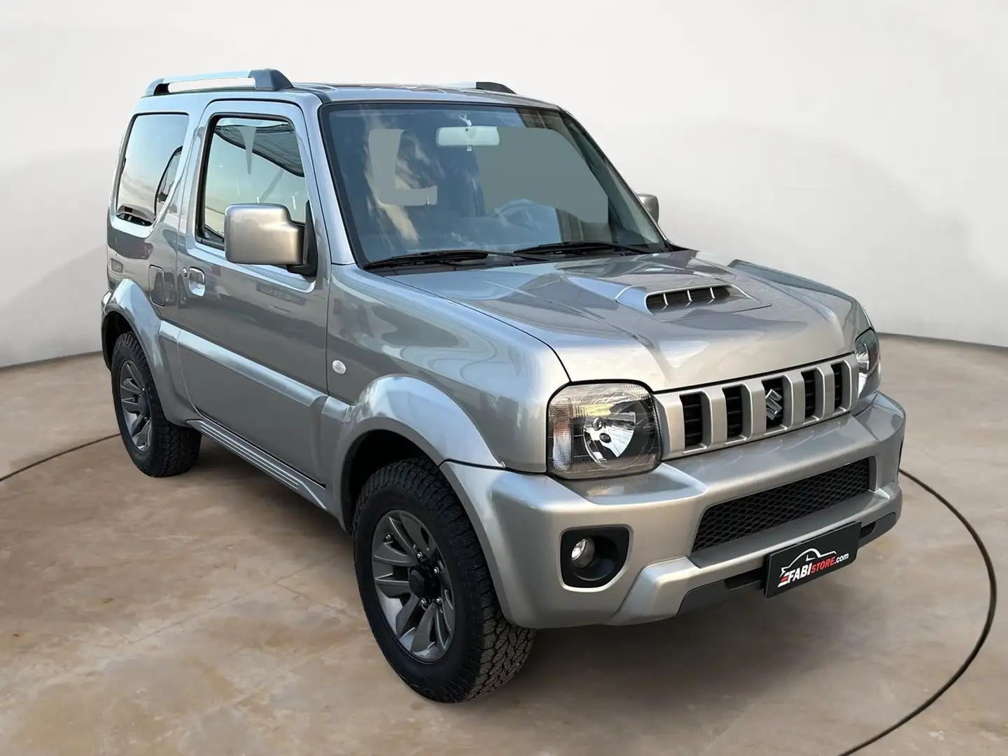 Suzuki Jimny 1.3 86 Cv Evolution Plus 4WD - Pelle, Clima, Radi Plateado - 1