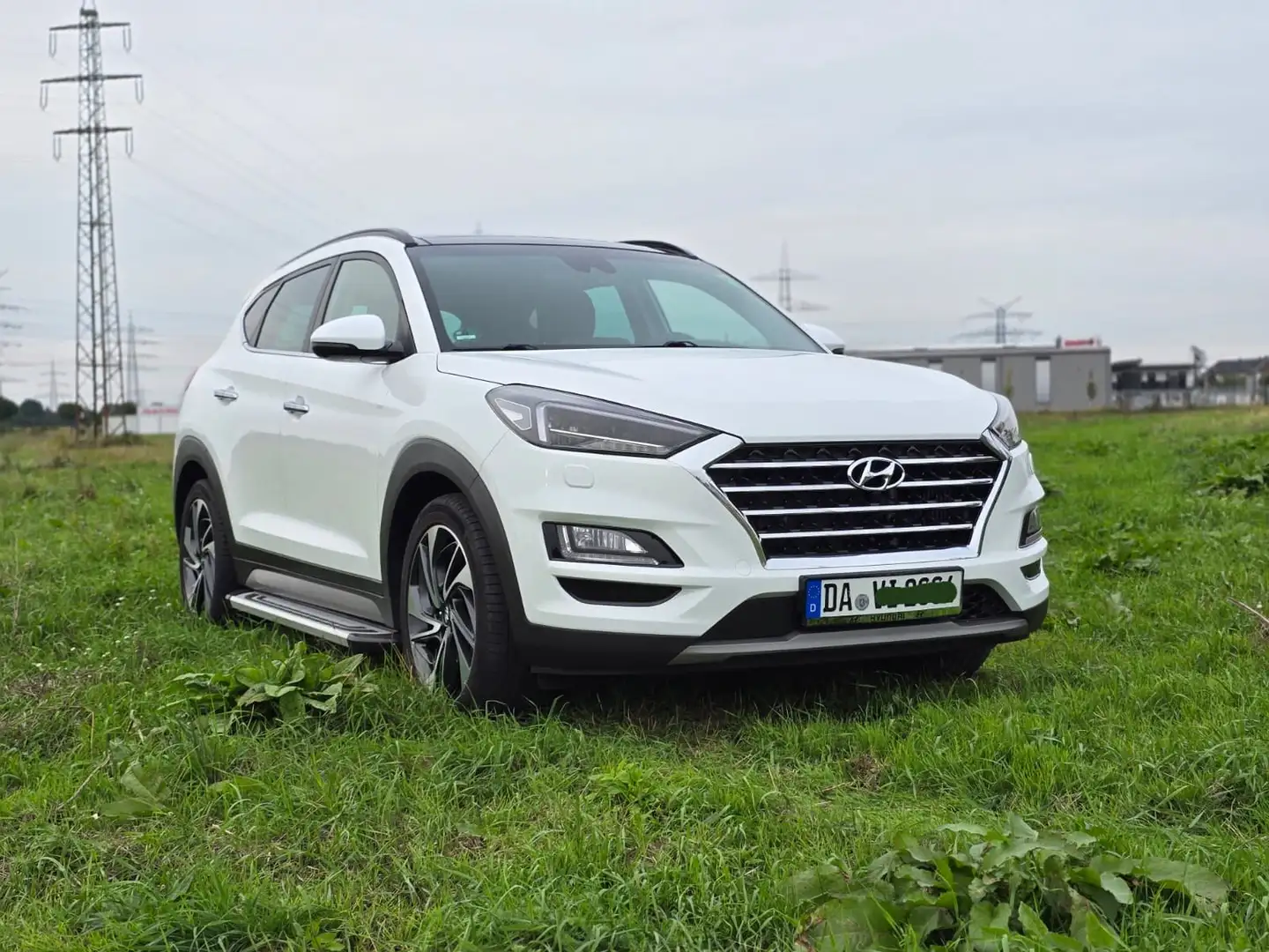 Hyundai TUCSON Tucson 1.6 GDi 4WD DCT Premium, Panoramadach Weiß - 1