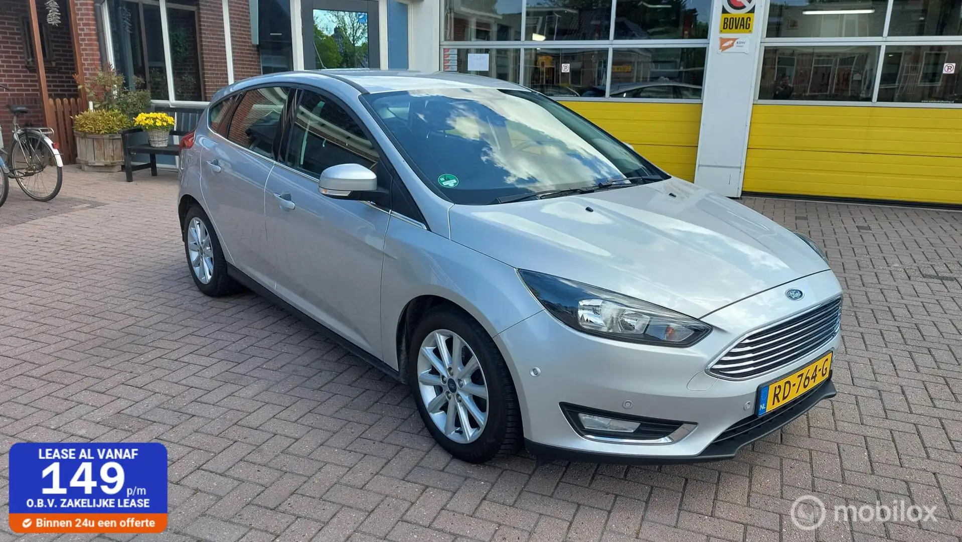 Ford Focus 1.0 Titanium Grijs - 1