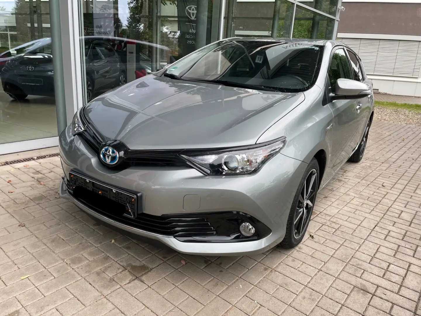 Toyota Auris 1.8 Hybrid Team D NAVI R-KAM STAND-HZ SHZ Grau - 1
