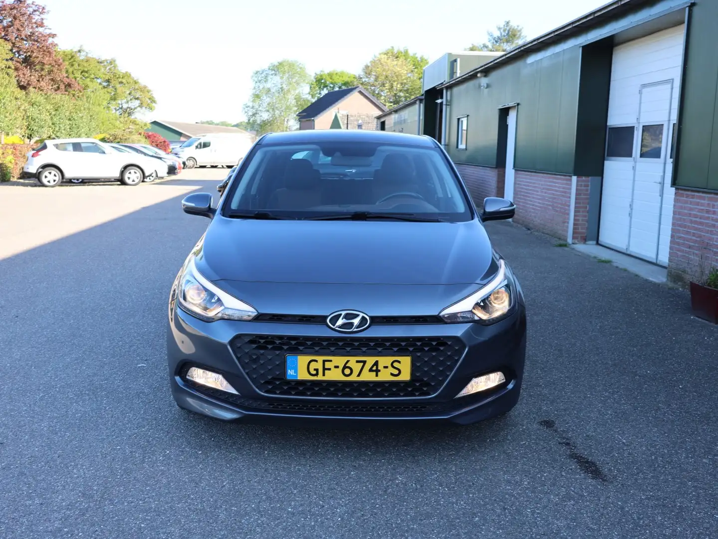 Hyundai i20 1.2 HP i-Motion, Airco, Radio, Blue tooth tel, Iso Grijs - 2