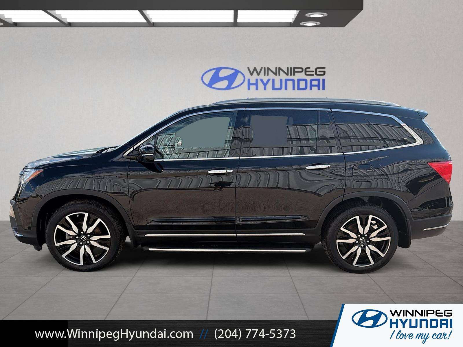 used 2021 Honda Pilot car, priced at $43,000