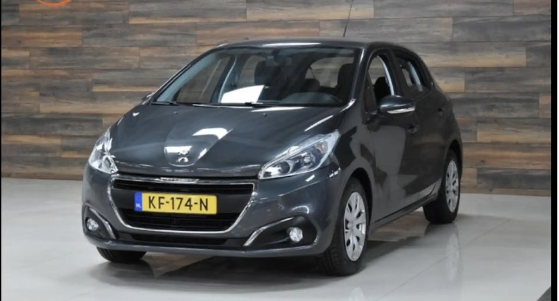 Peugeot 208 1.2 PT Blue Lease Grijs - 2