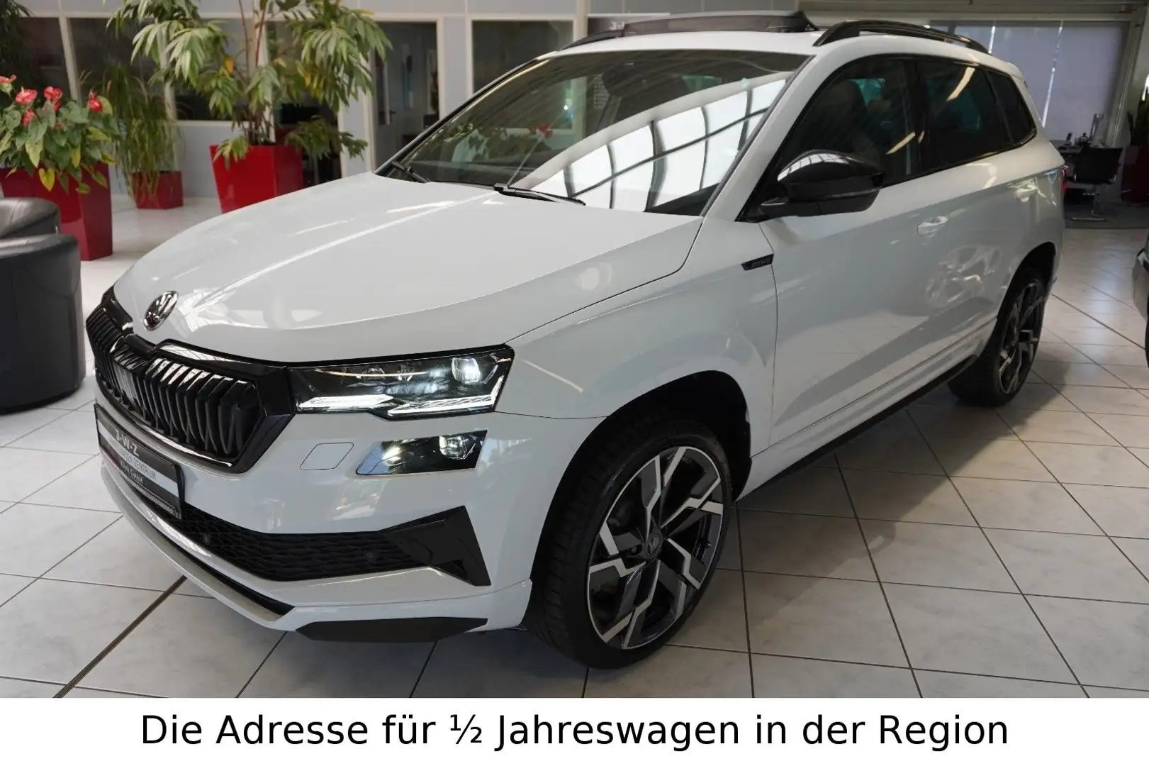 Skoda Karoq Sportline 1.5 TSI DSG*AHK*Pano*Kamera*ACC* Weiß - 1