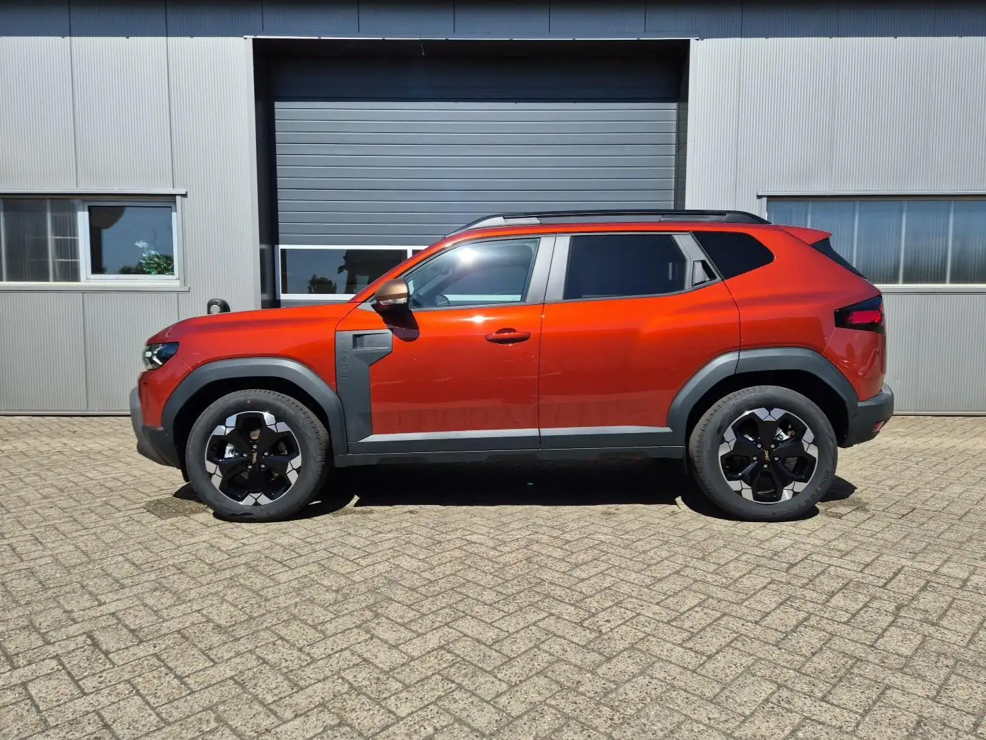 Dacia Duster Extreme Hybrid 140PS Automatik 1.6 SCE Lenkradh... Braun - 2