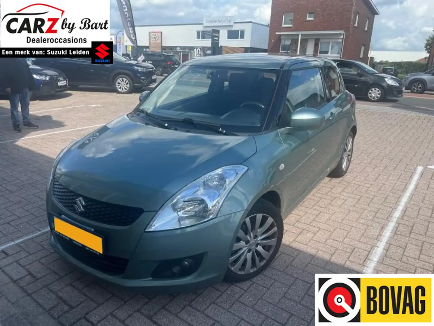 Suzuki Swift 1.2 EXCLUSIVE AUTOMAAT Clima | Cruise | Stoelverwa Groen - 1