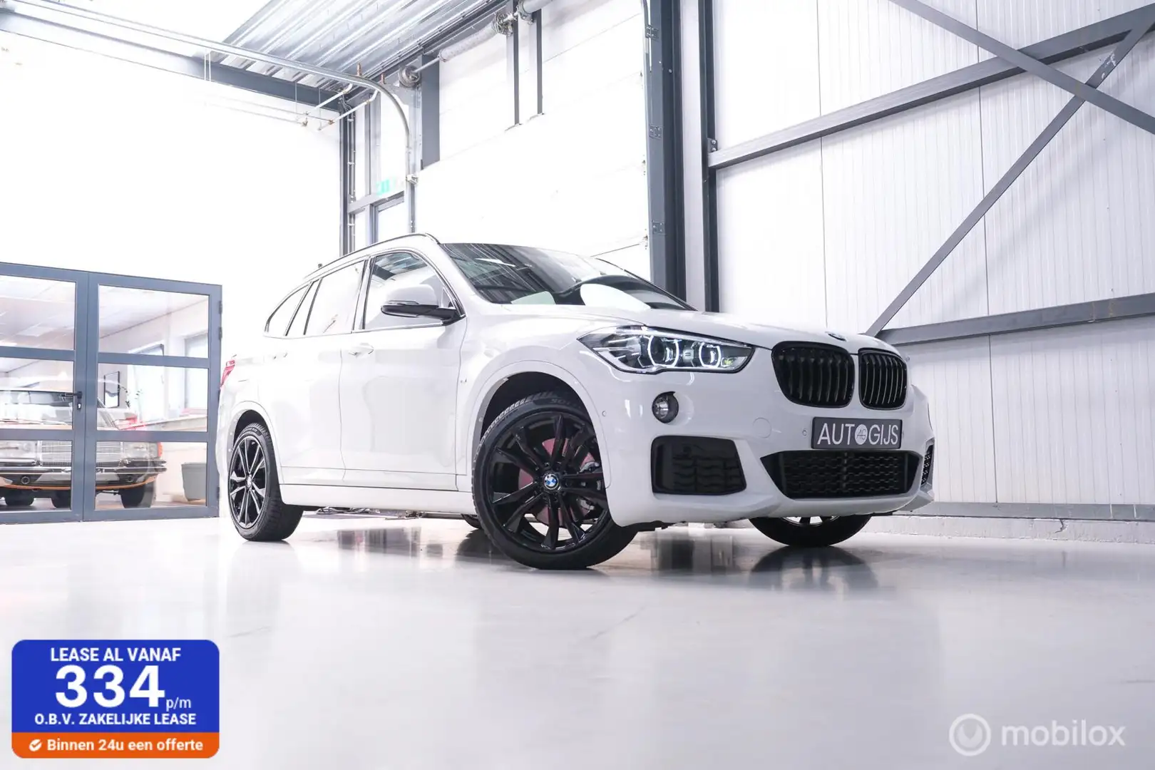 BMW X1 sDrive20i M pakket | Panoramadak | Leder | LED | S Wit - 1