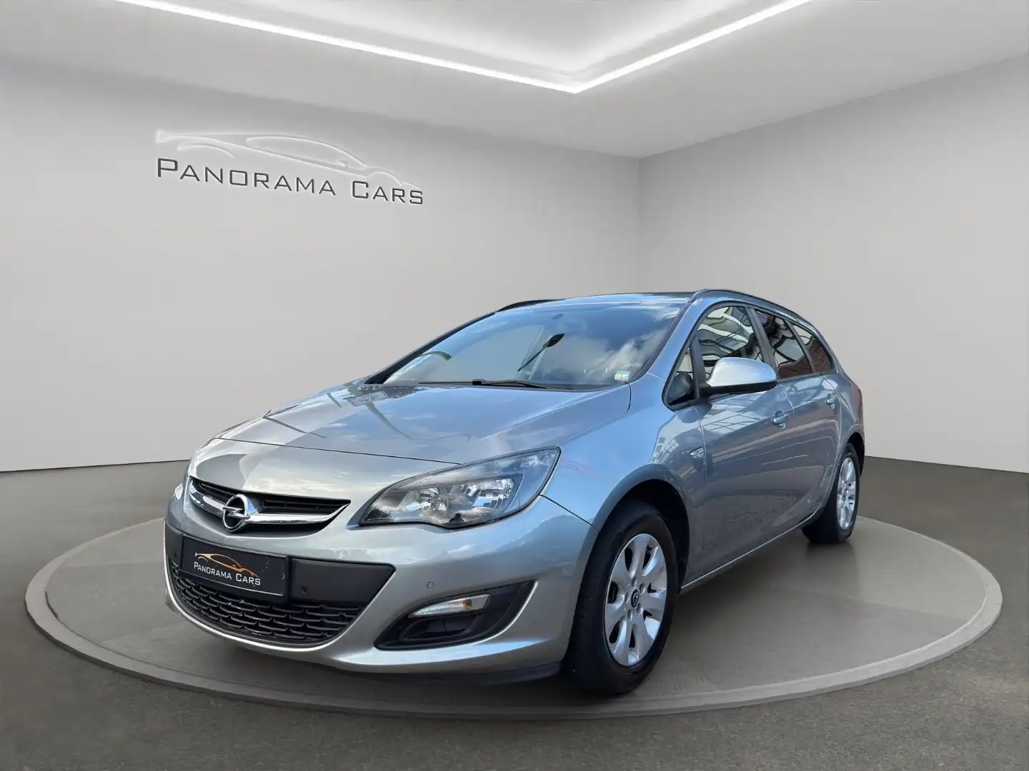 Opel Astra J Sports Tourer/PDC/Navi/StHz/Tempomat Zilver - 1