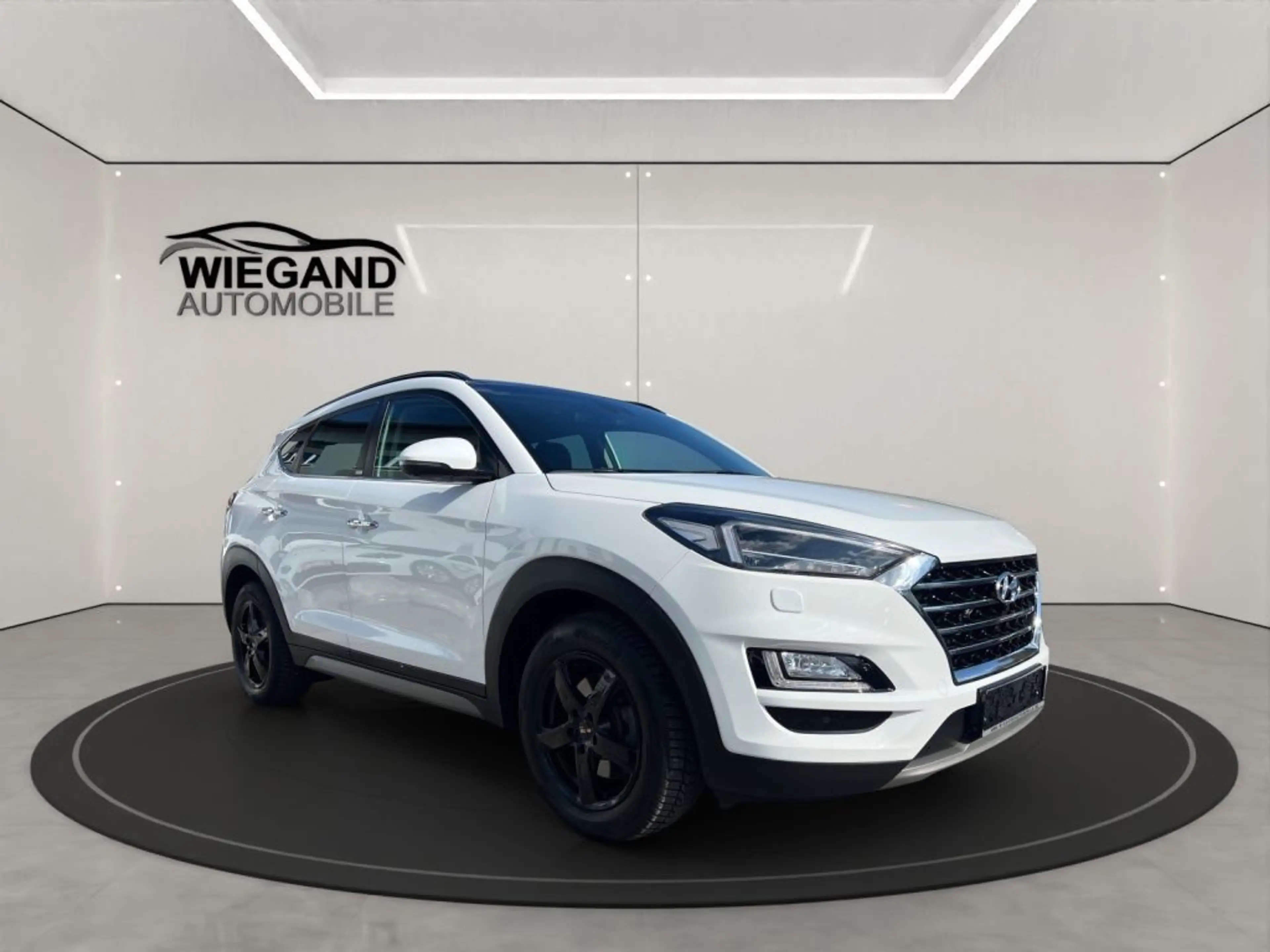 Hyundai TUCSON 1.6 GDi 4WD DCT Premium *Pano* — photo 7