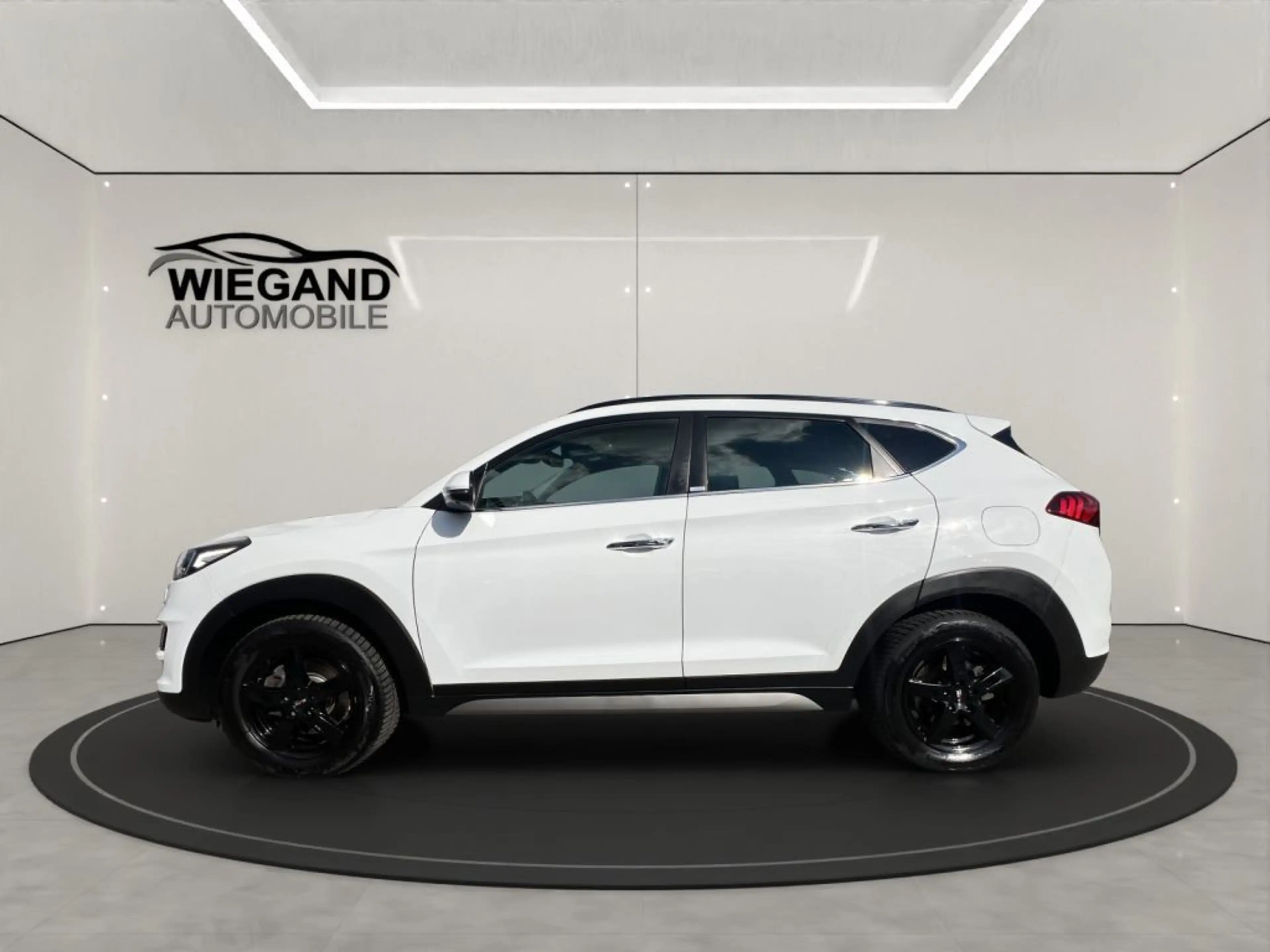 Hyundai TUCSON 1.6 GDi 4WD DCT Premium *Pano* — photo 2