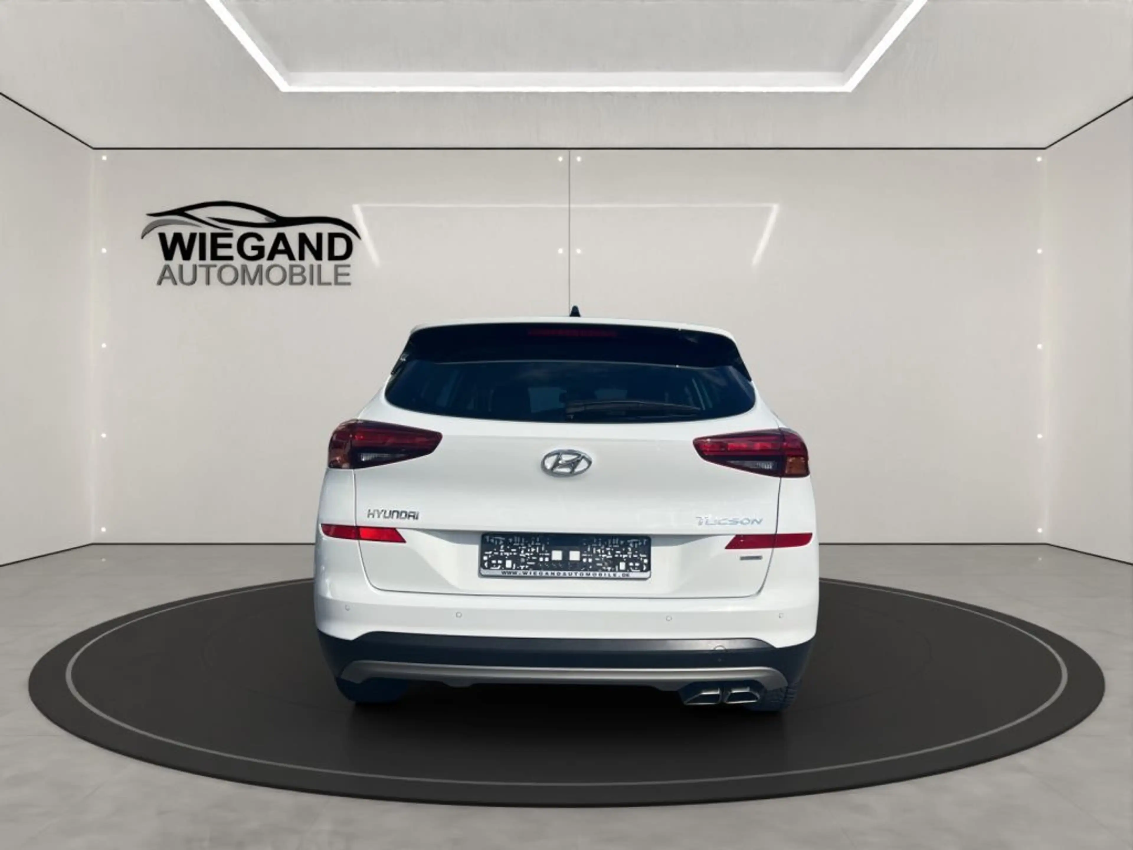 Hyundai TUCSON 1.6 GDi 4WD DCT Premium *Pano* — photo 4