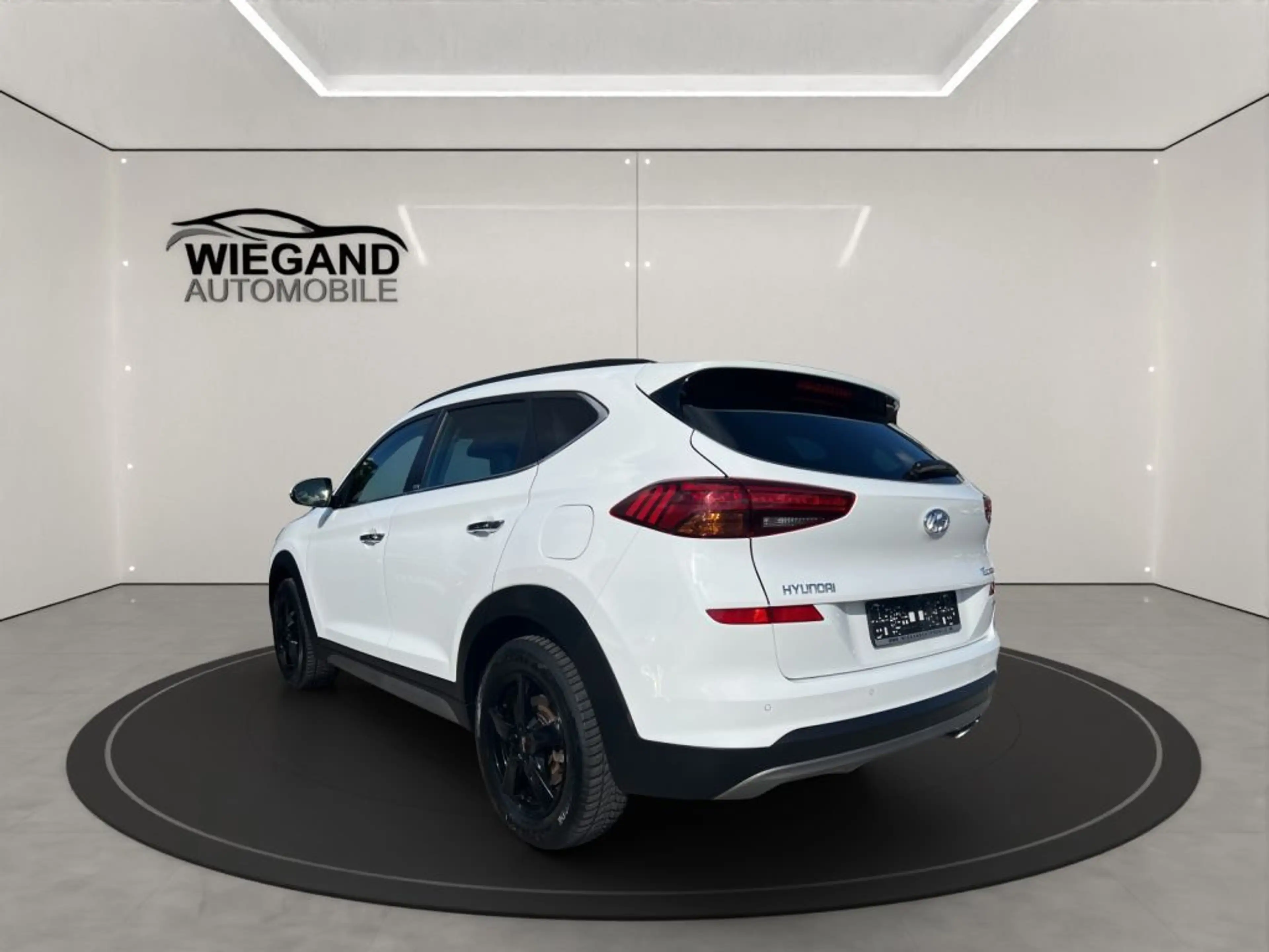 Hyundai TUCSON 1.6 GDi 4WD DCT Premium *Pano* — photo 3