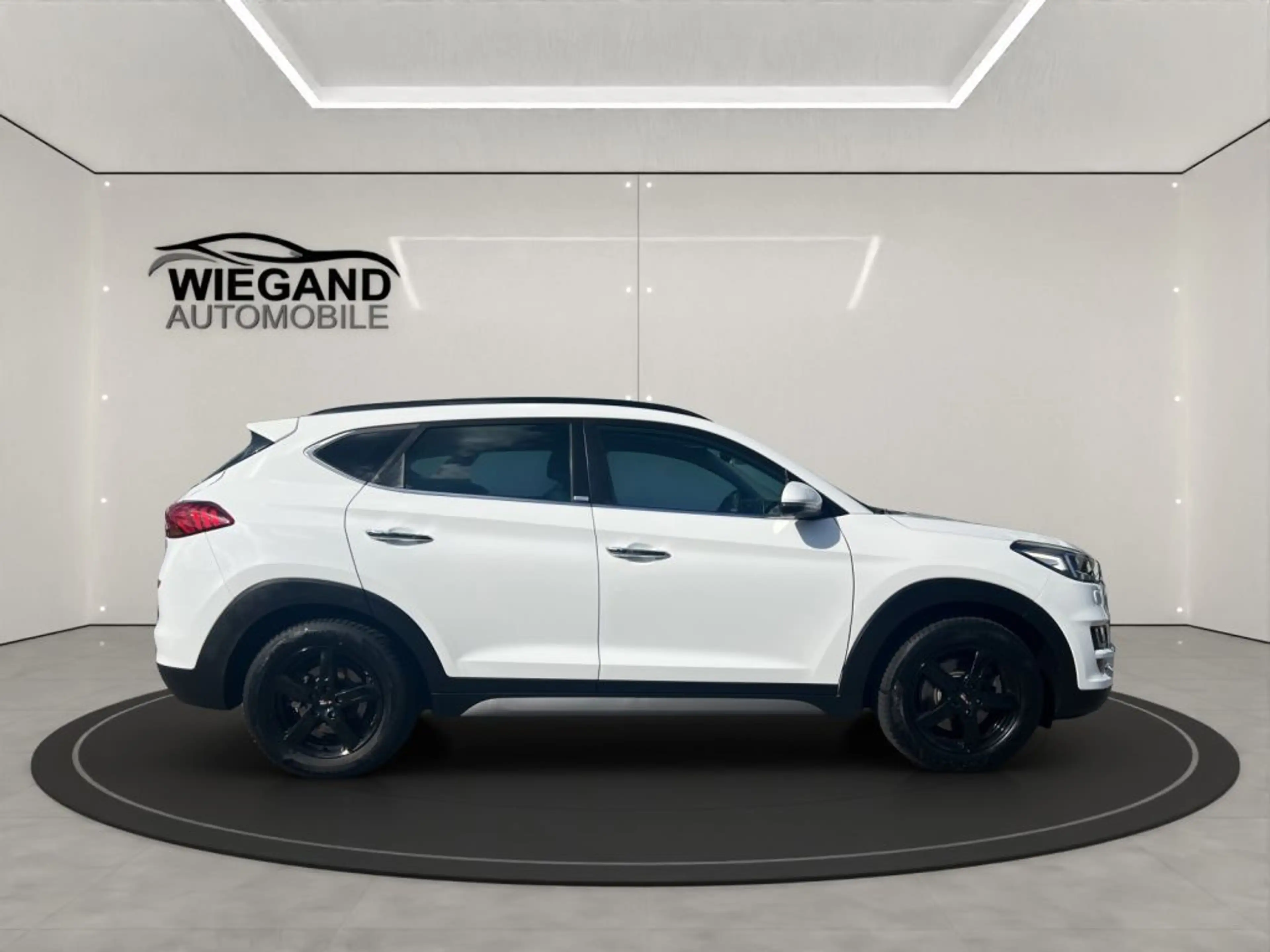 Hyundai TUCSON 1.6 GDi 4WD DCT Premium *Pano* — photo 6