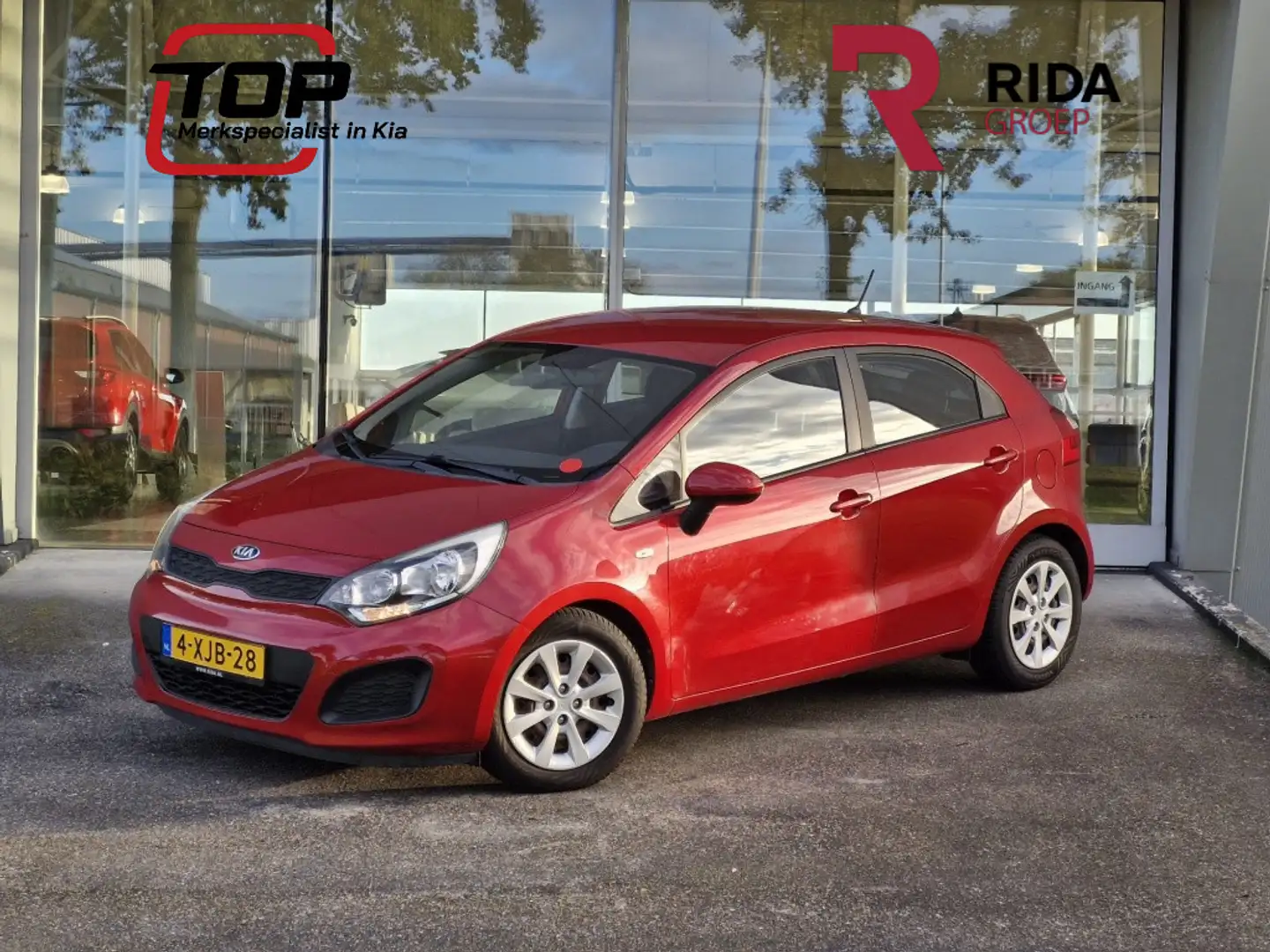 Kia Rio 1.2 CVVT 5-drs Comfort Rosso - 1