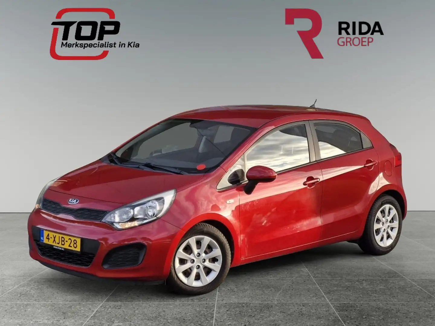 Kia Rio 1.2 CVVT 5-drs Comfort Rouge - 1