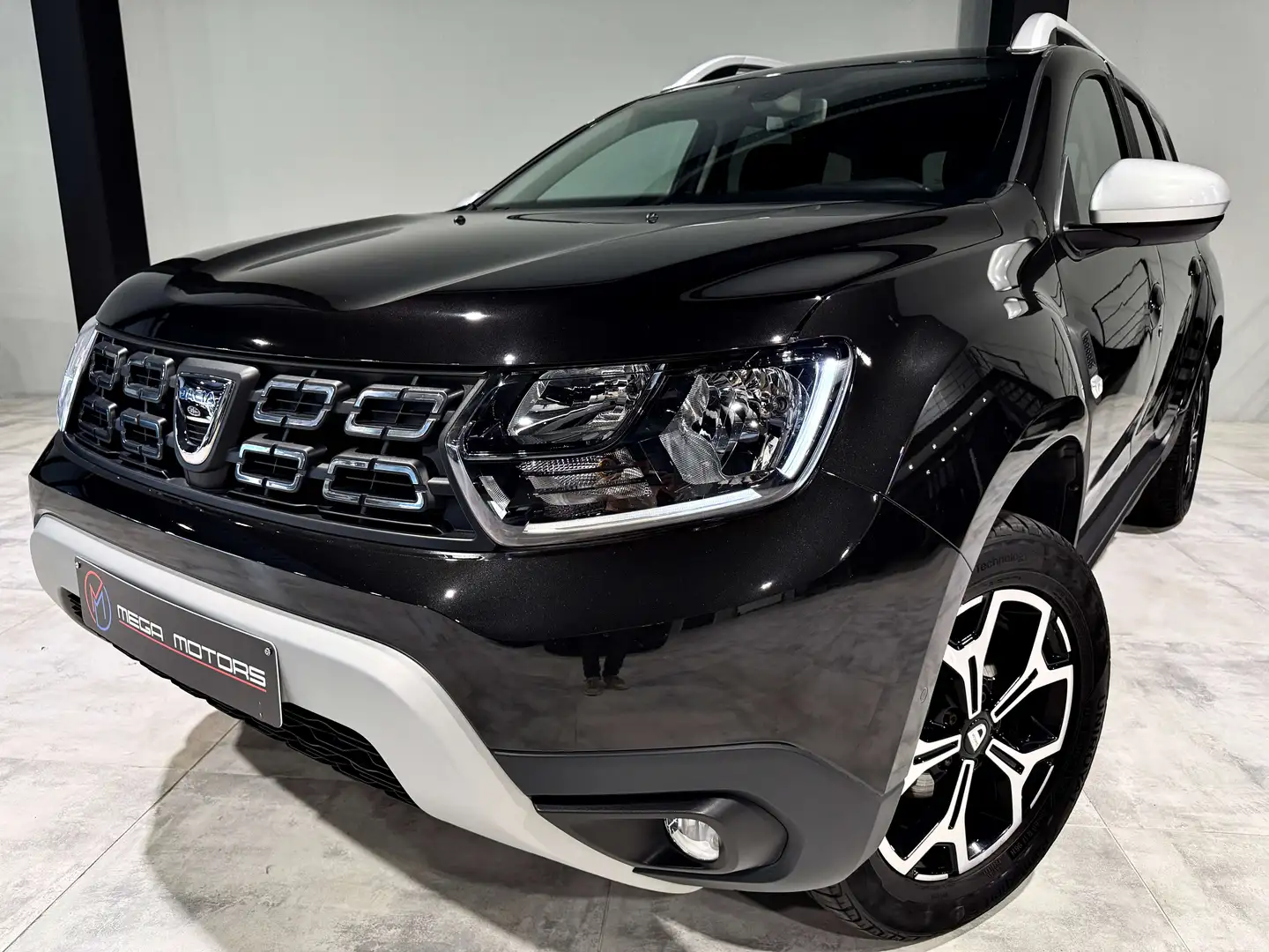 Dacia Duster 1.6i SCe 115CV \PRESTiGE\ NAVi CAMERA CLiM CRUiSE+ Noir - 1