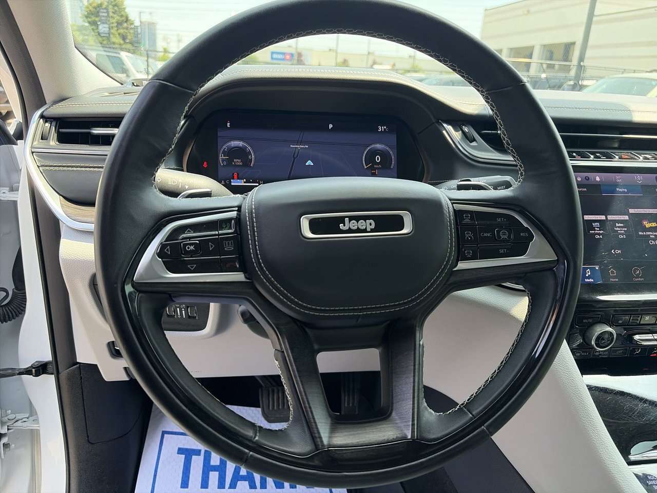 used 2022 Jeep Grand Cherokee car, priced at $44,598