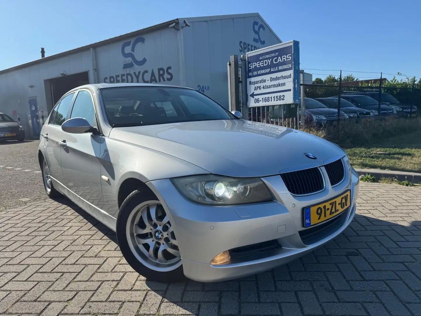 BMW 320 3-serie 320i High Executive Navi Schuifdak Leer Cl Grijs - 1
