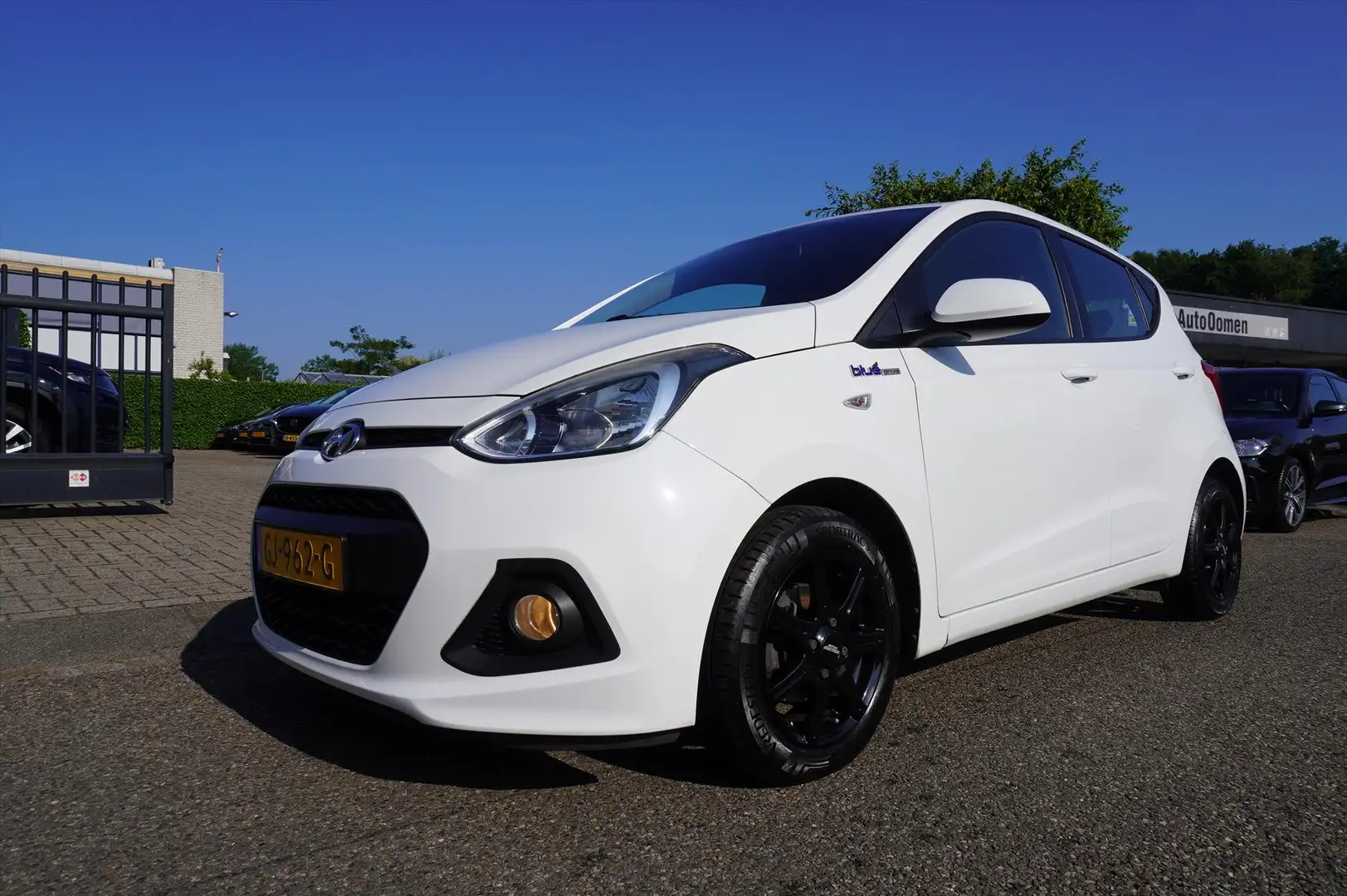 Hyundai i10 1.0i 66pk Blue Comfort Plus Clima LM Cruise Contro Blanc - 1