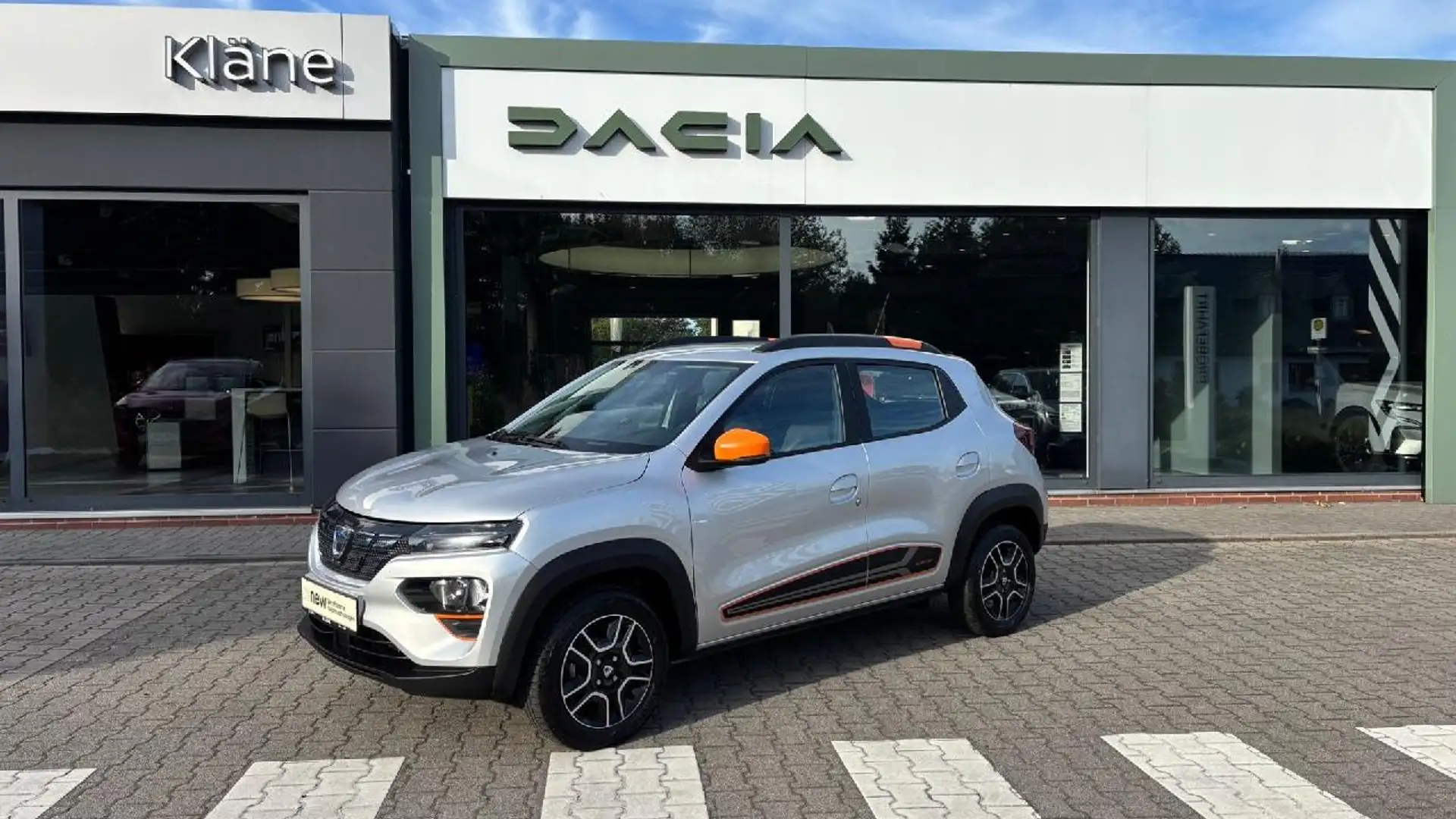 Dacia Spring Comfort Plus Grau - 1