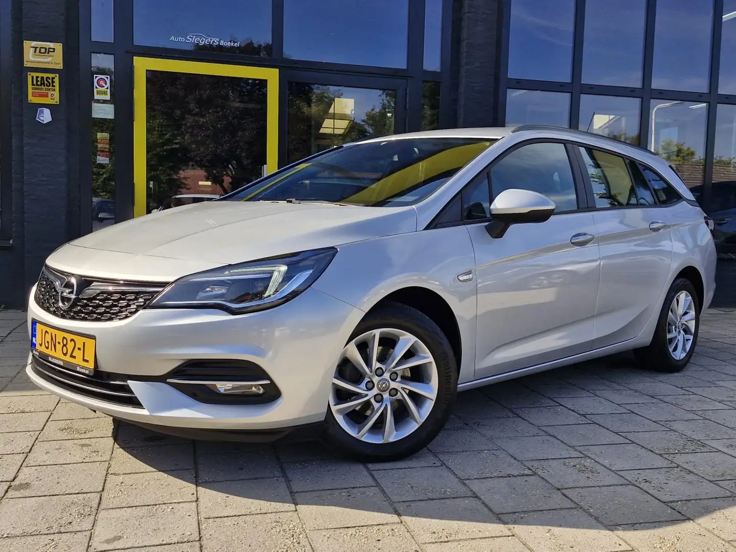 Opel Astra SPORTS TOURER 1.2 130PK | Trekhaak | Park Sens Ach Gris - 1