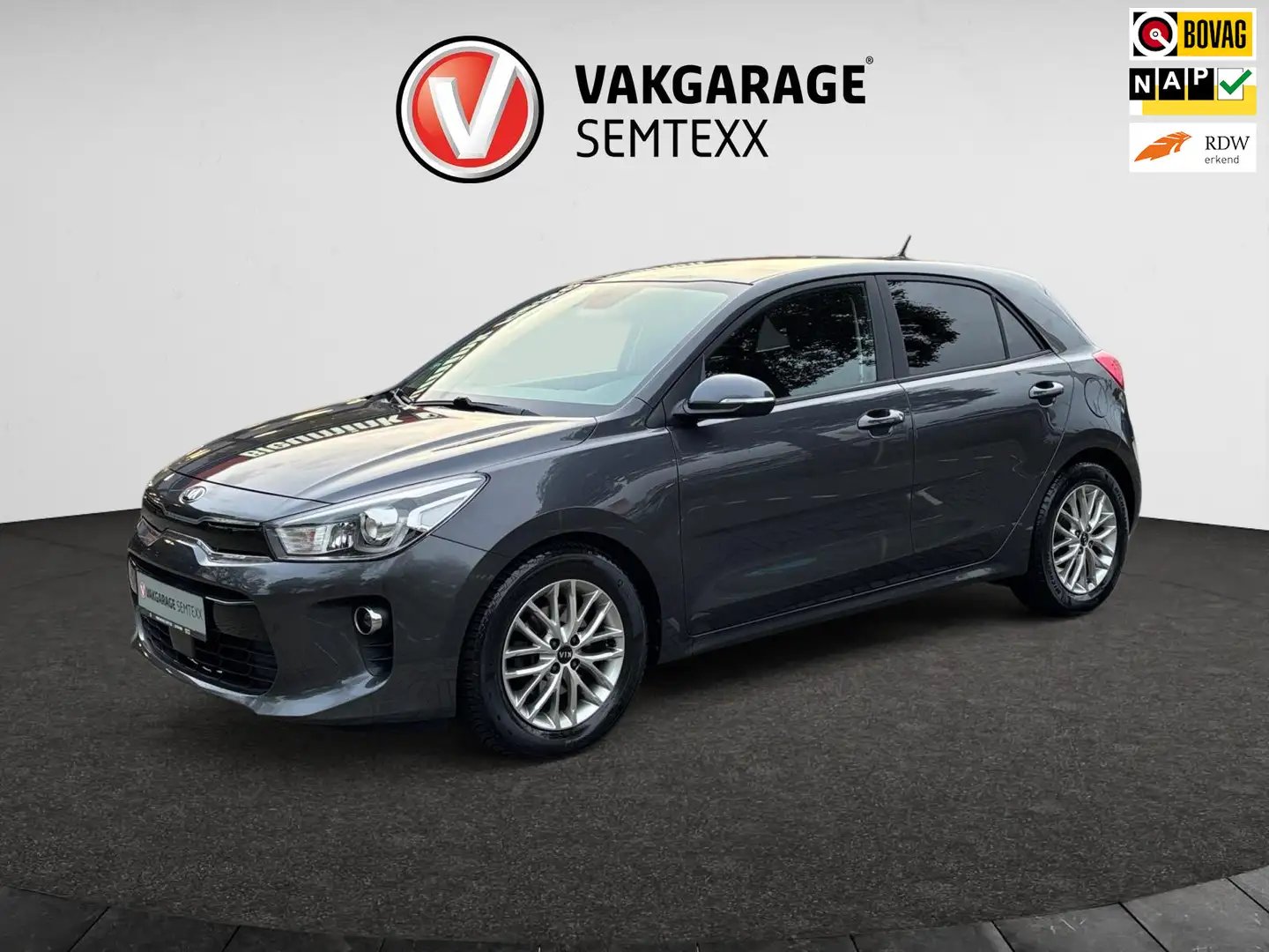 Kia Rio 1.0 TGDI DynamicLine | Airco | Camera | Cruise | N Grijs - 1