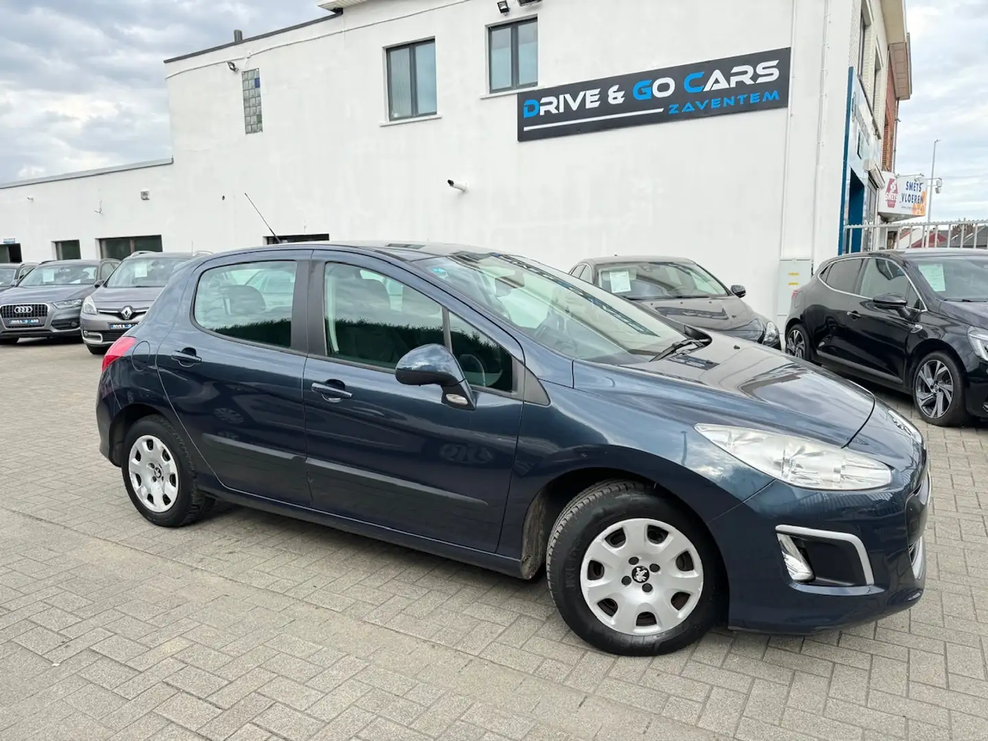 Peugeot 308 1.4i Benzine - Airco ** 1 JAAR GARANTIE ** !! Gris - 1