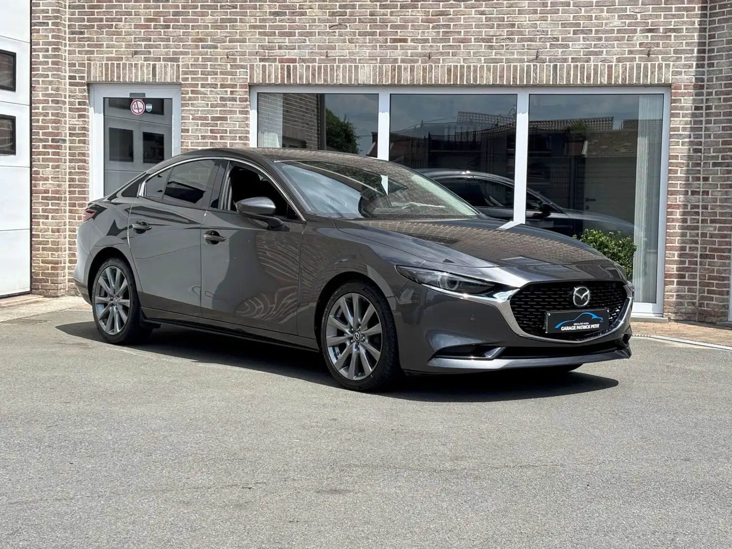 Mazda 3 2.0 M-HYBRID SKYCRUISE Sedan / 87000km / 12m wb Grau - 1