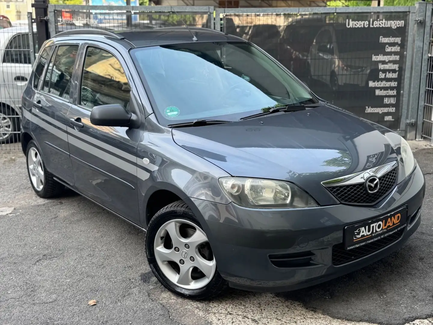 Mazda 2 Lim. 1.4 Exclusive*2.Hand*Klima*Allwetter* Grau - 1