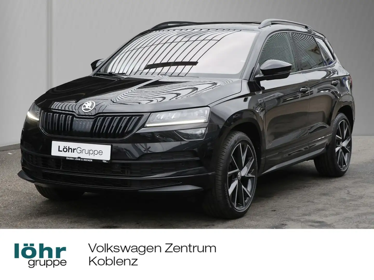 Skoda Karoq 2.0 TDI DSG Sportline 4x4 AHK/RFK/Pano Schwarz - 1