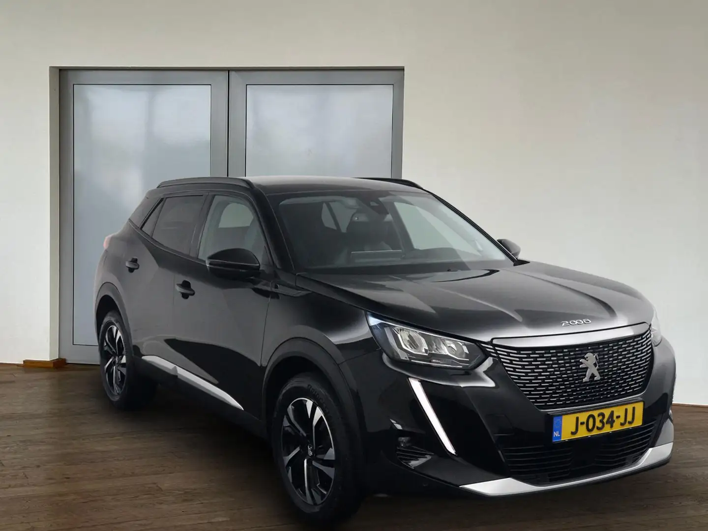Peugeot 2008 1.2 PureTech Blue Lease Allure*ECC*NAVI*CRUISE* Zwart - 2