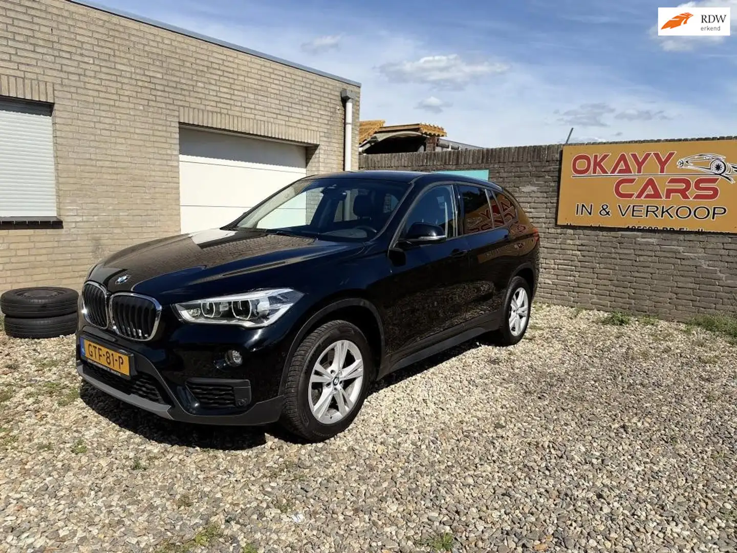 BMW X1 XDrive20i High Executive Automaat, Cam, Navi Zwart - 1