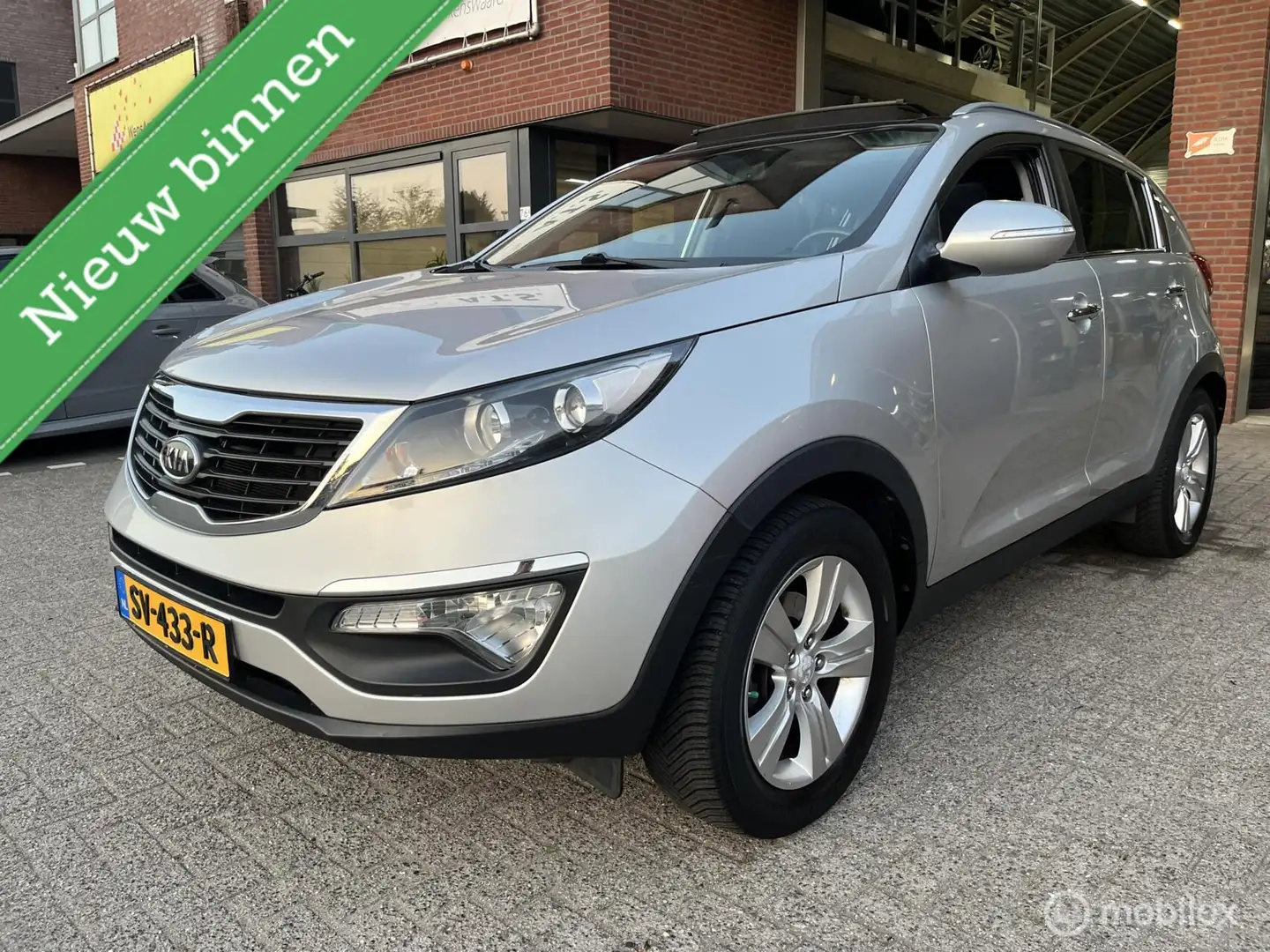 Kia Sportage 1.6 GDI ISG X-ecutive Plus Pack PANO-DAK*NAVI* Grijs - 1