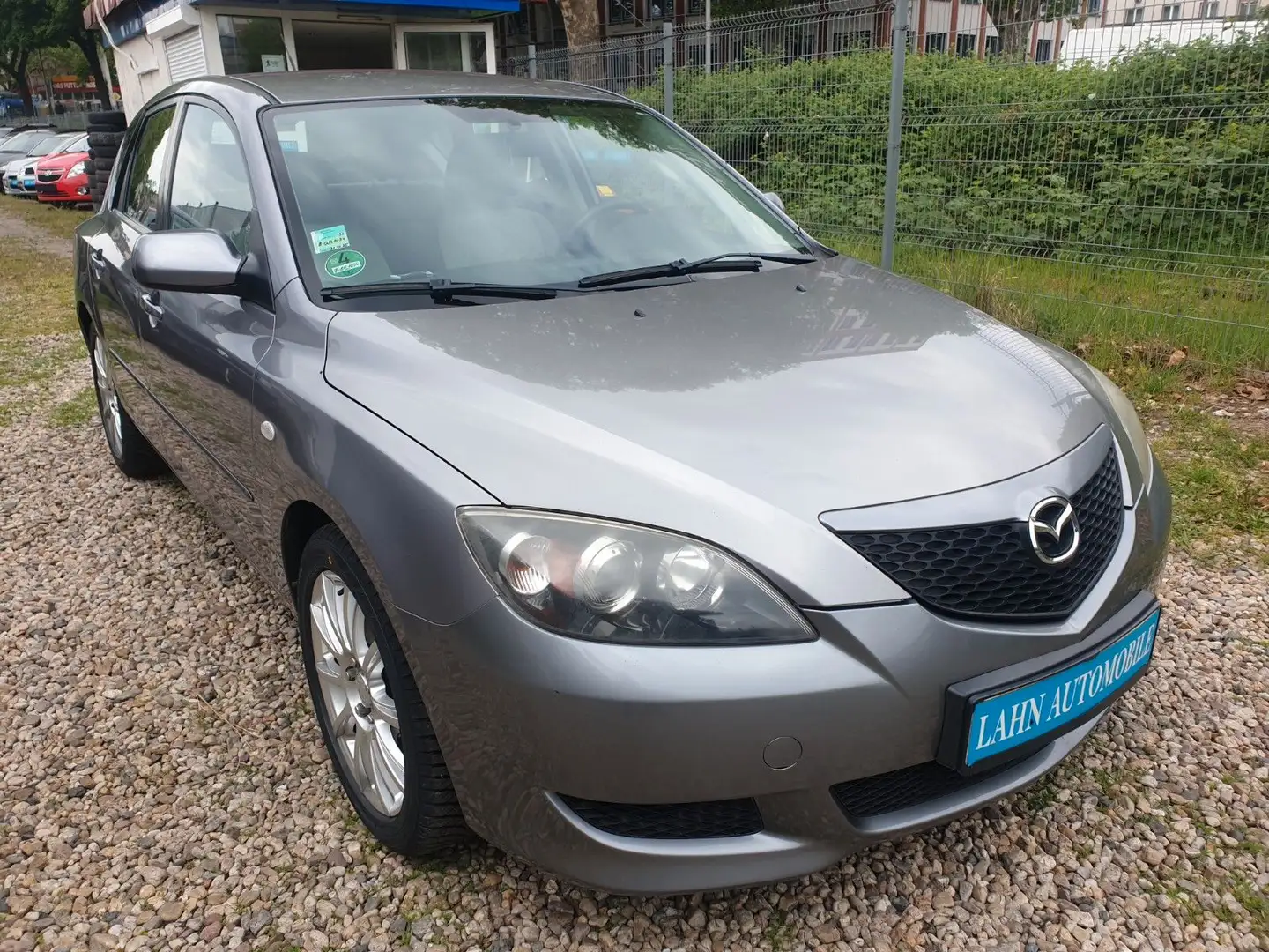 Mazda 3 Lim. 1.4 Sport Comfort*TÜV-Neu* siva - 1