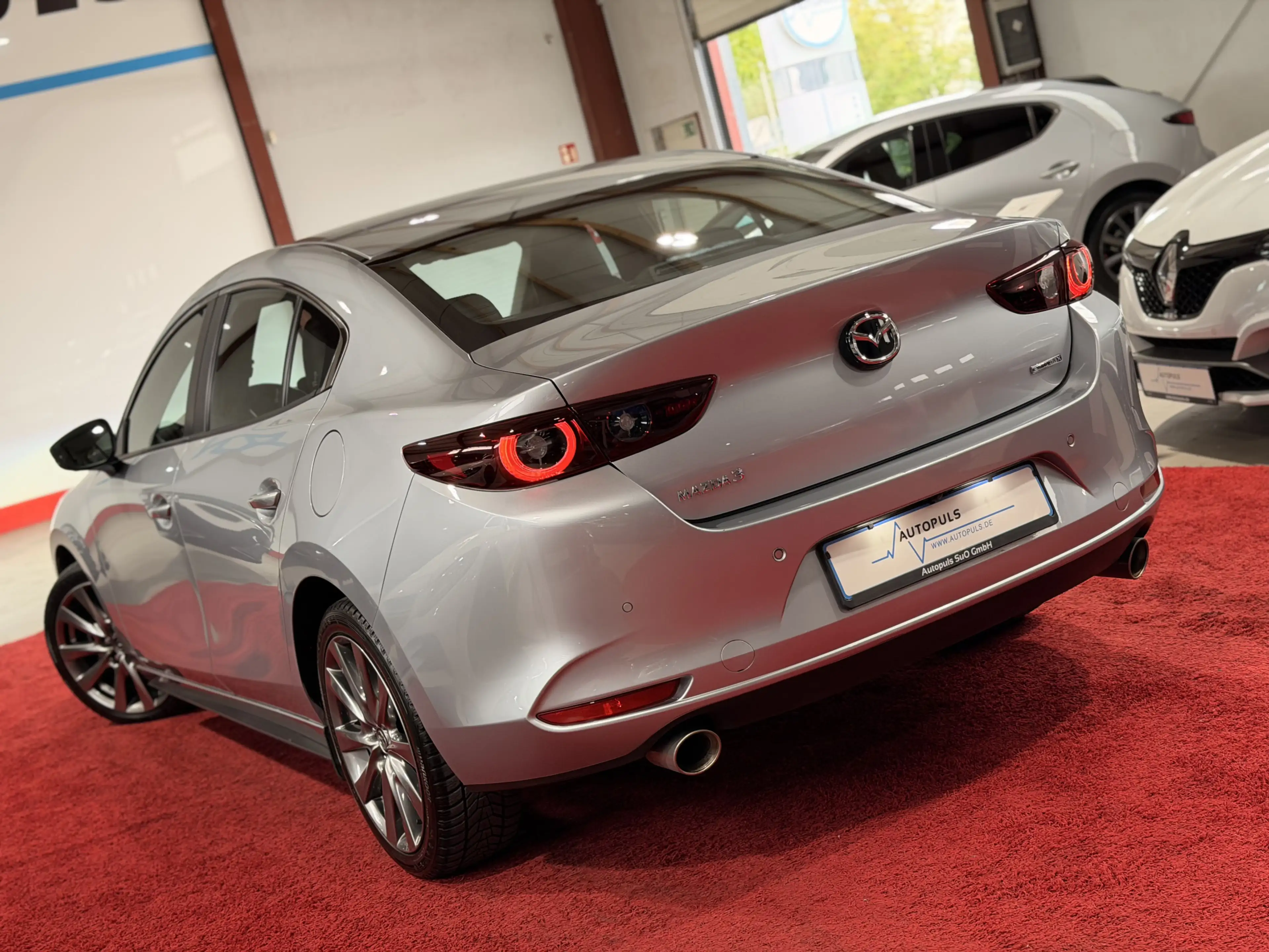 Mazda 3 Selection*BOSE*HUD*CARPLAY*LED*ACC*LEDER* — photo 7
