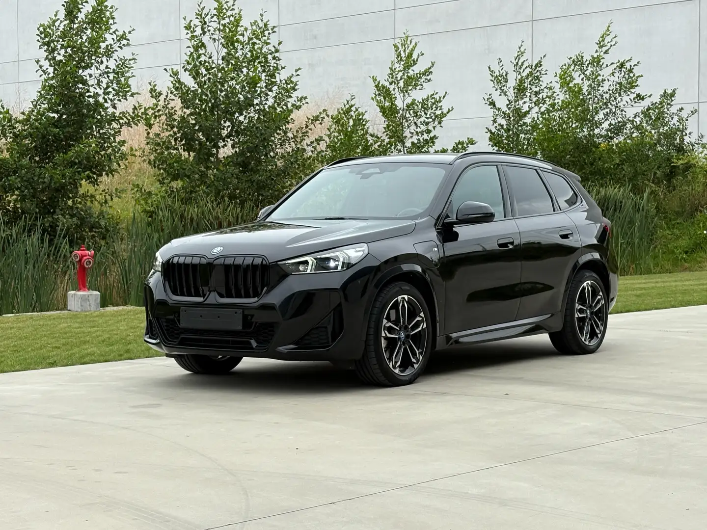 BMW X1 xDrive30e M pakket Premium HK Massag Trekh 19" Noir - 1
