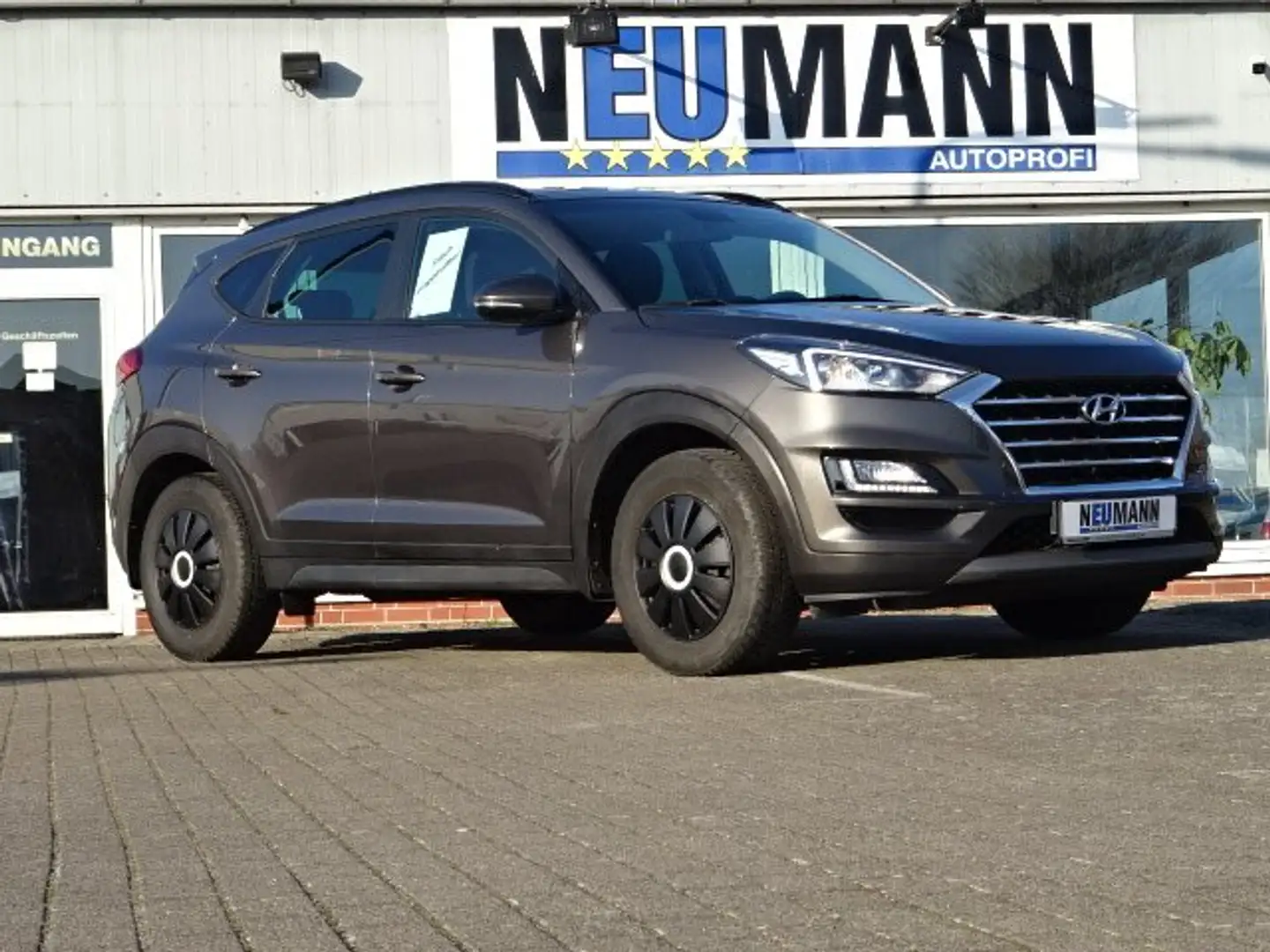 Hyundai TUCSON Trend 2WD Pano-Dach Automatik R-Cam Navi Temp. Brun - 1