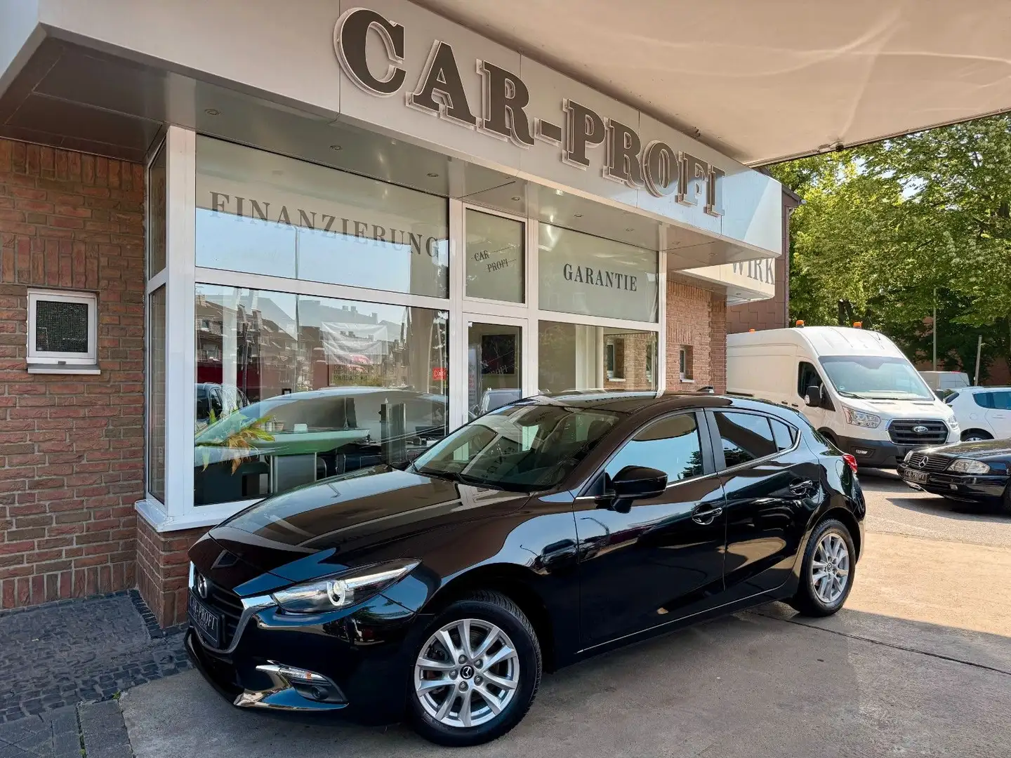 Mazda 3 Lim. Exclusive-Line Navi/PDC/Bluetooth Zwart - 1