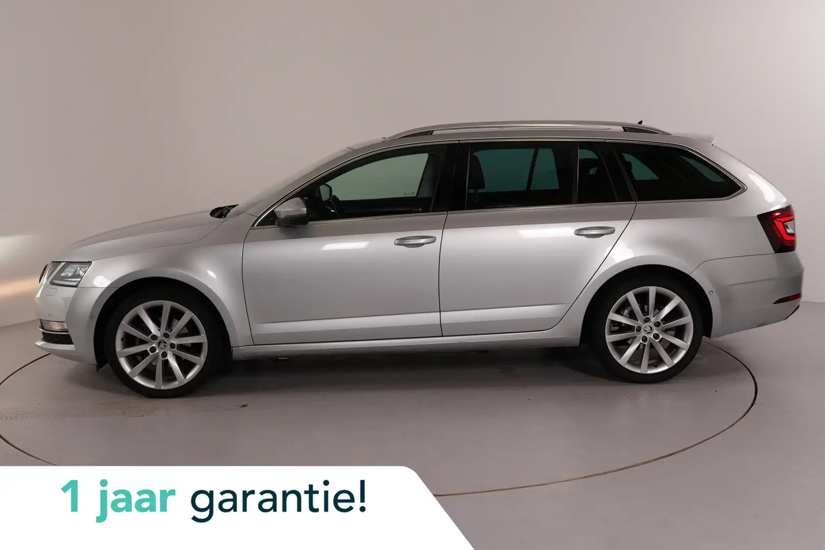 Skoda Octavia Combi 1.5 TSI Greentech | Trekhaak | Pano | Leder Grijs - 1