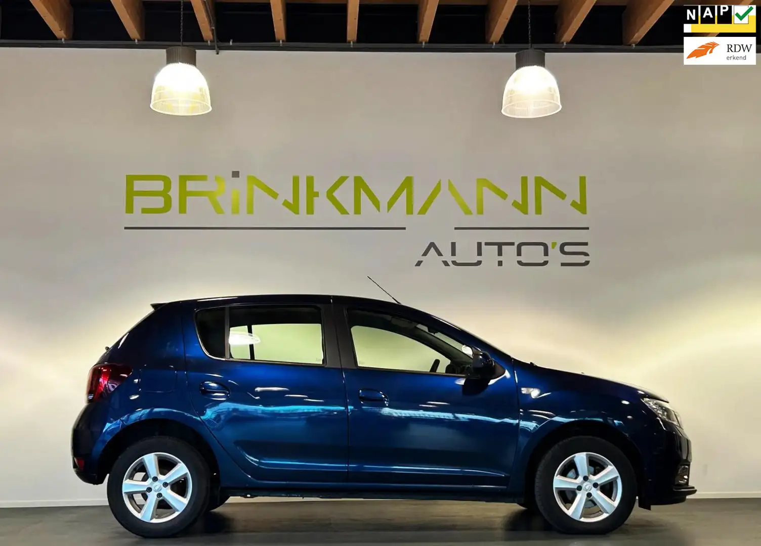 Dacia Sandero 0.9 TCe SL Royaal - Airco - Nav. - PDC - Cr. Contr Bleu - 1