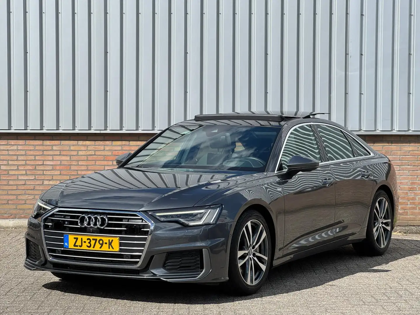 Audi A6 Limousine 55 TFSI quattro Sport S-Line V6 340pk/ P Gris - 1