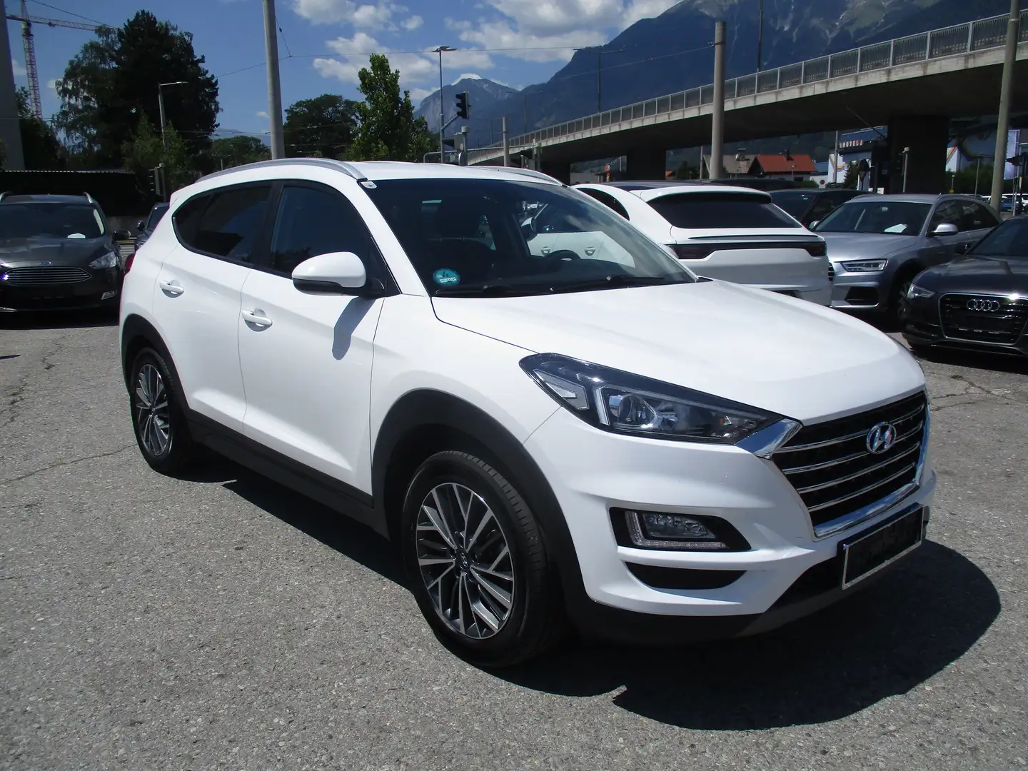 Hyundai TUCSON Trend Mild-Hybrid 4WD Automatik NAVI Camera Weiß - 1