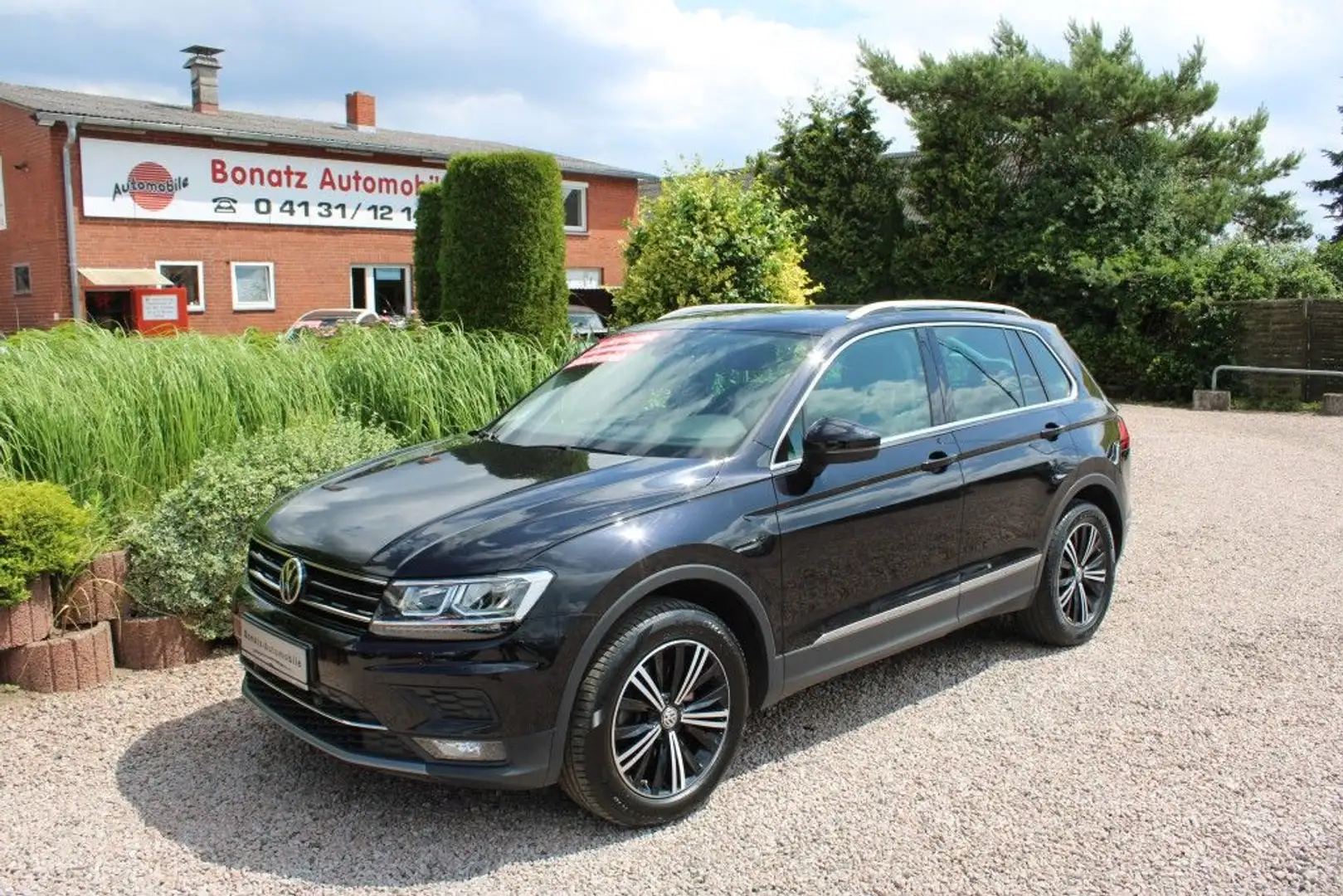 Volkswagen Tiguan 2.0 TDI 4x4 DSG Highline *Navi,SHZ,Panorama,AHK* Noir - 1