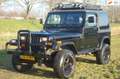 Jeep Wrangler 2.5i Hardtop 4X4 NL-AUTO NAP/UNIEK/APK 2025 Zwart - thumbnail 1