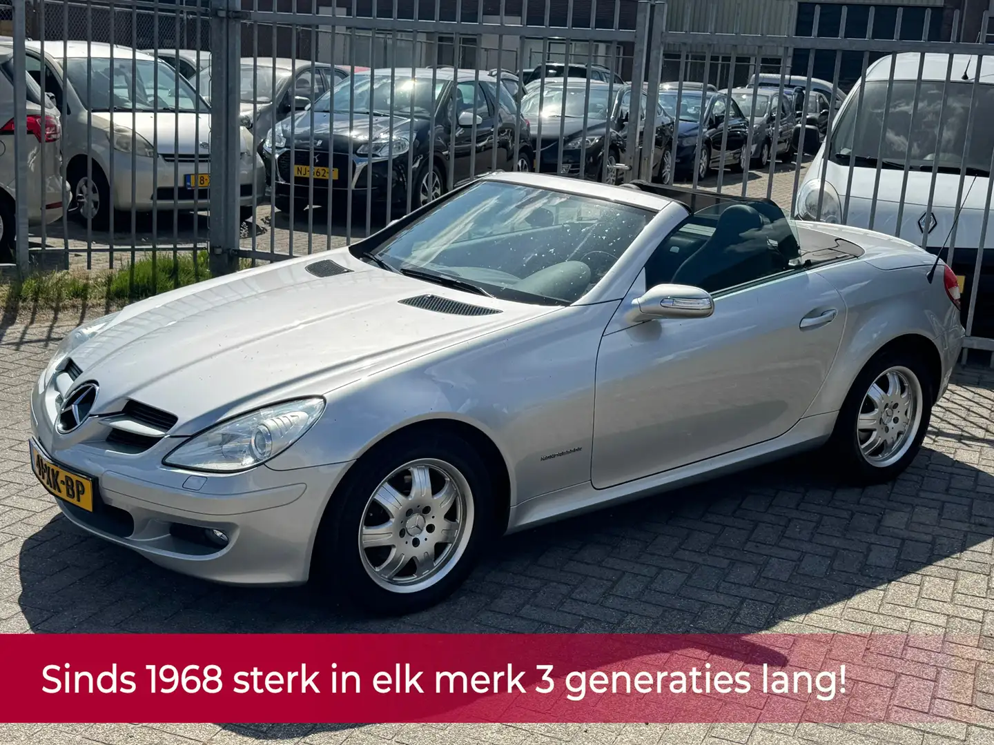 Mercedes-Benz SLK 200 K. AUTOMAAT! Leer l Navi l Cruise l Airco l Stoelv Grijs - 1