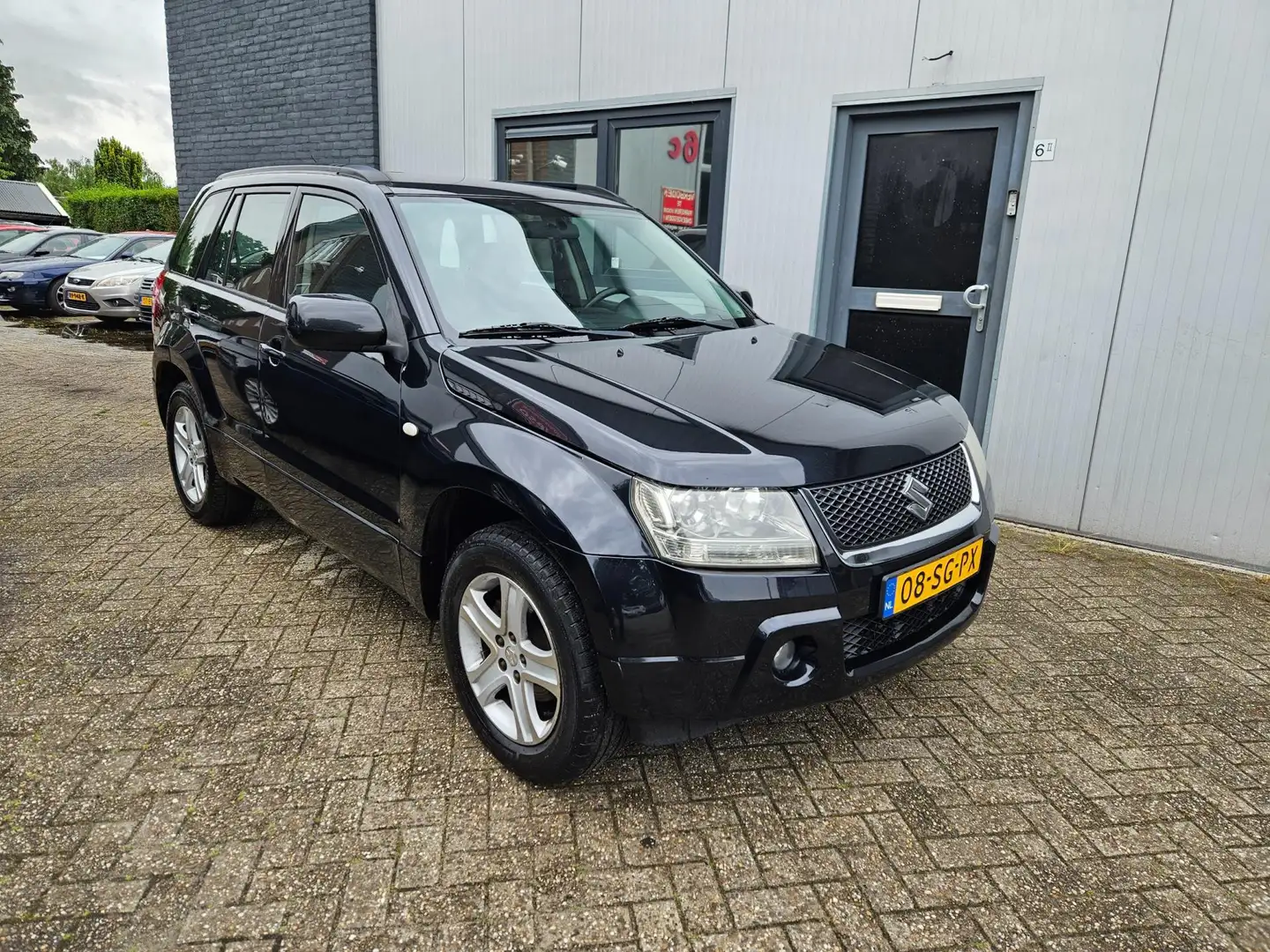 Suzuki Grand Vitara 2.0-16V Exclusive Automaat 4x4 Zwart - 1