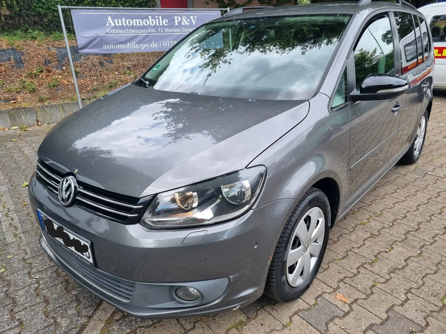 Volkswagen Touran Style7 SITZER*NAVI*KLIMA*SITZH*AHK* Grau - 1