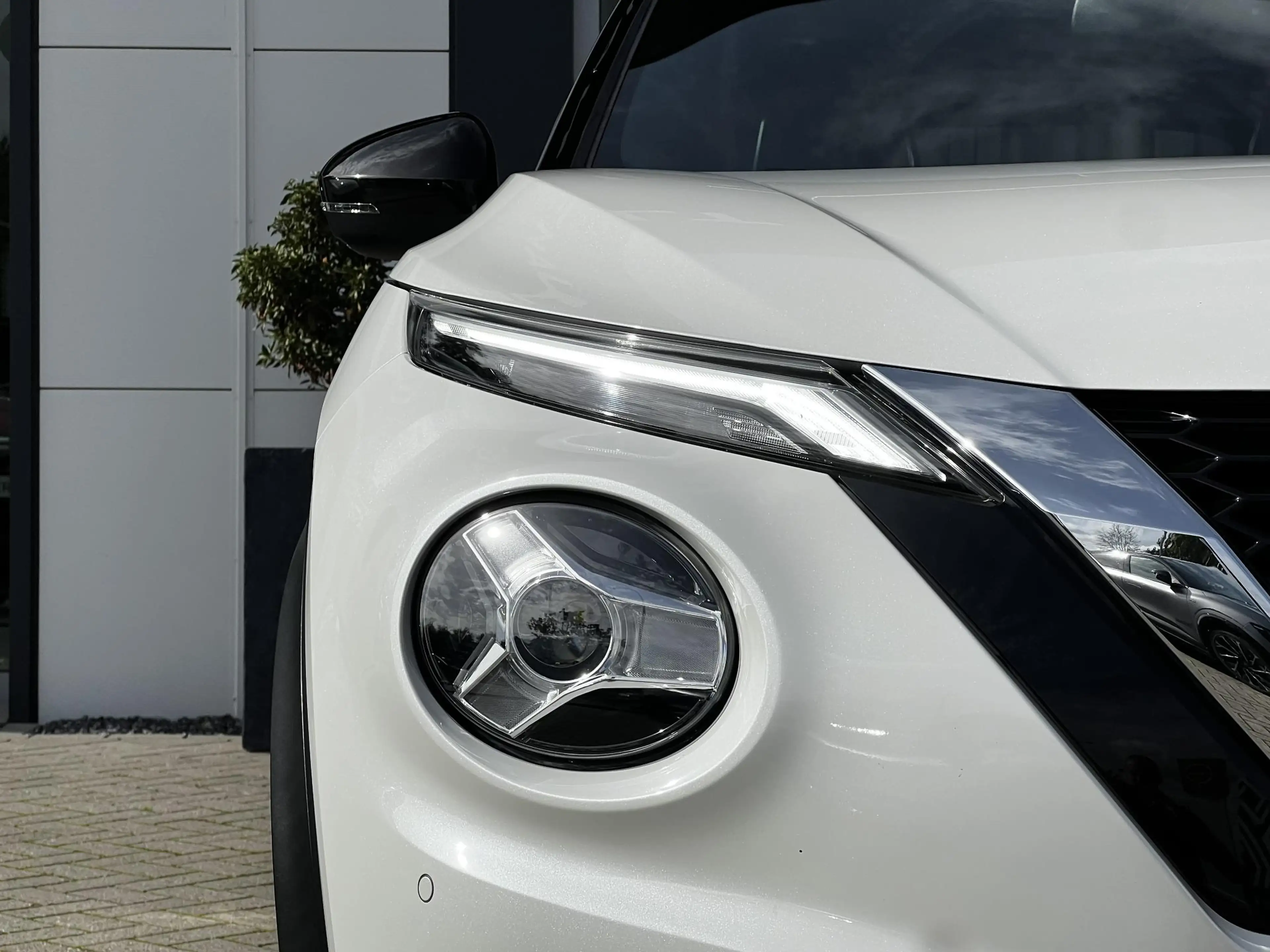 Nissan Juke 1.0 DIG-T Tekna | Trekhaak | BOSE-audio | 360 came — photo 27